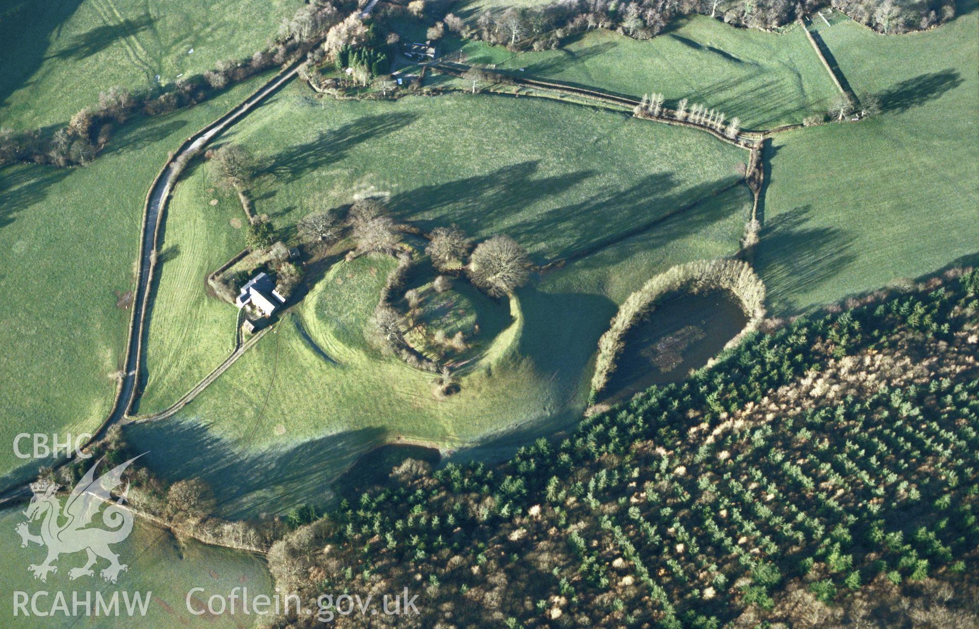 RCAHMW colour slide oblique aerial photograph of Sycharth Castle, Llansilin, taken by C.R.Musson on the 22/12/1996