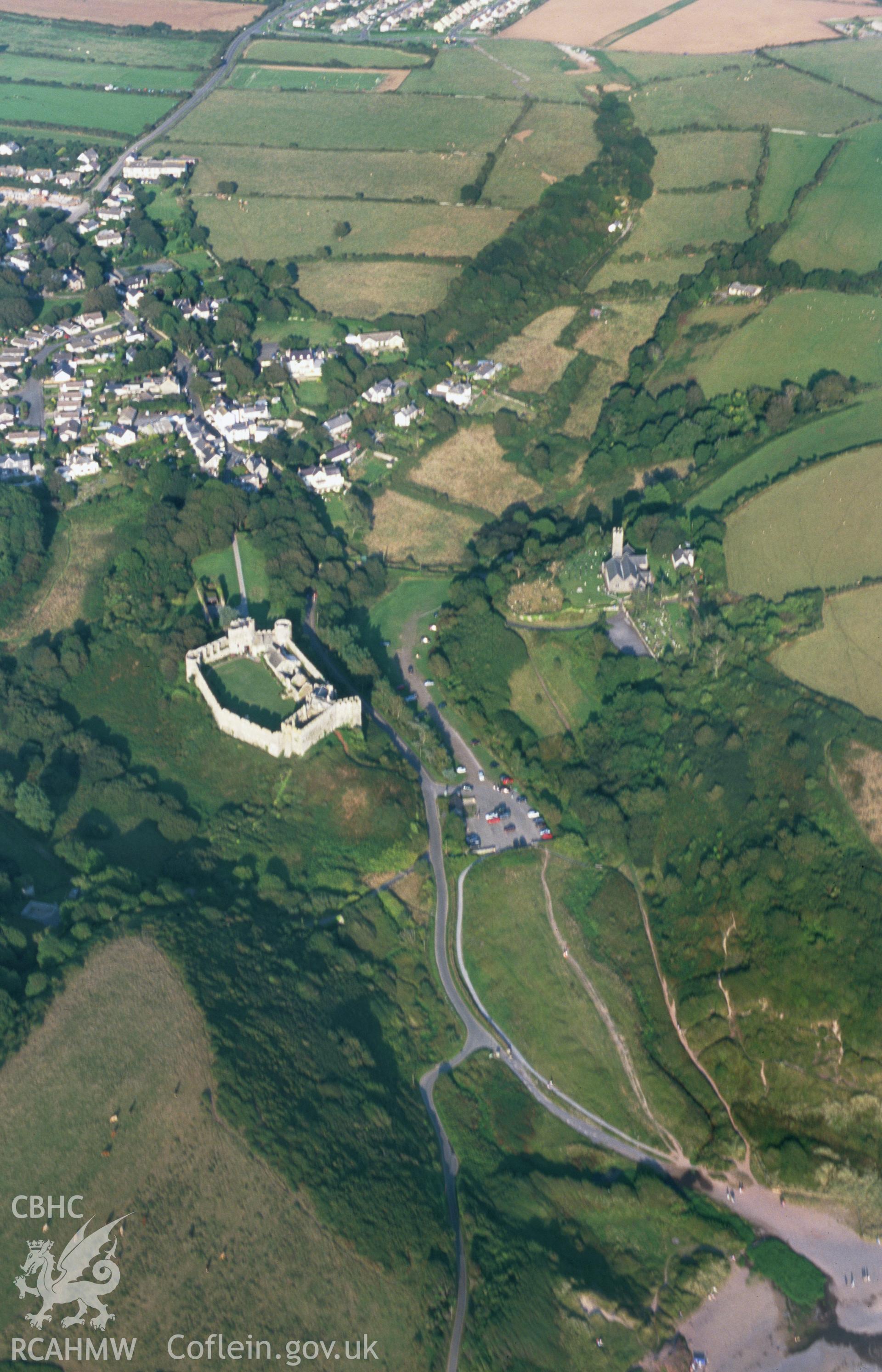 RCAHMW colour slide oblique aerial photograph of Manorbier Castle, Manorbier, taken by T.G.Driver on the 23/08/2000