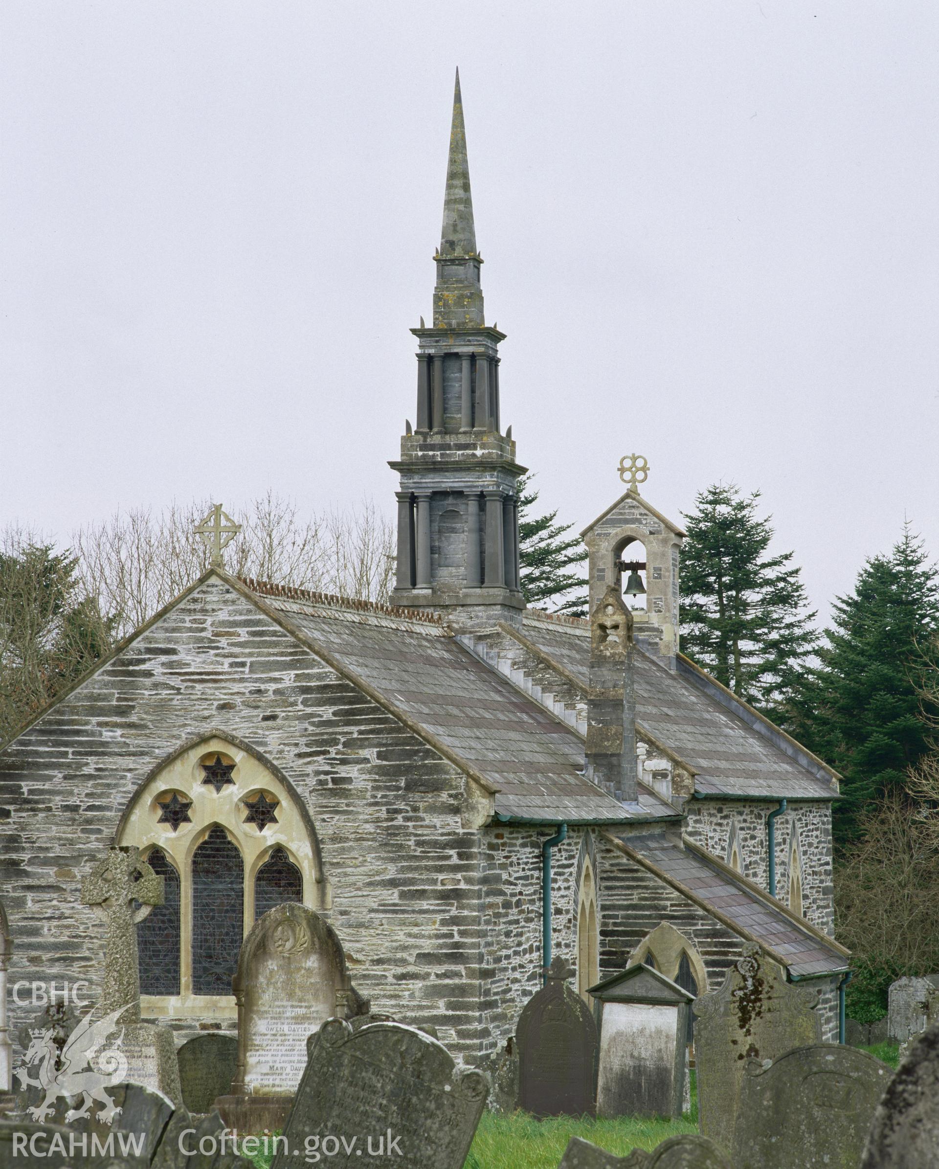 Colour transparency showing an exterior  view of St Cynllo's Church, Llangoedmor, produced by Iain Wright, June 2004.