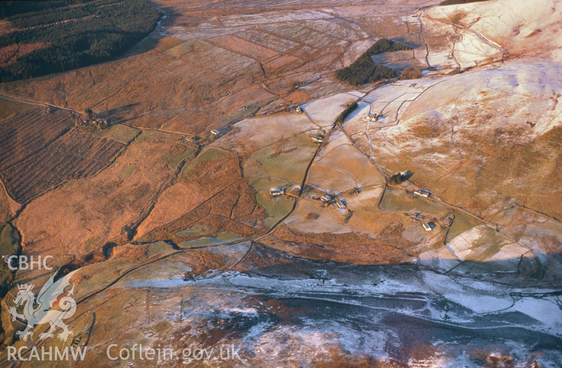 RCAHMW colour slide oblique aerial photograph of a squatter settlement bnetween Lluest and Tanlan-fawr, Pontarfynach, taken on 11/01/1999 by Toby Driver