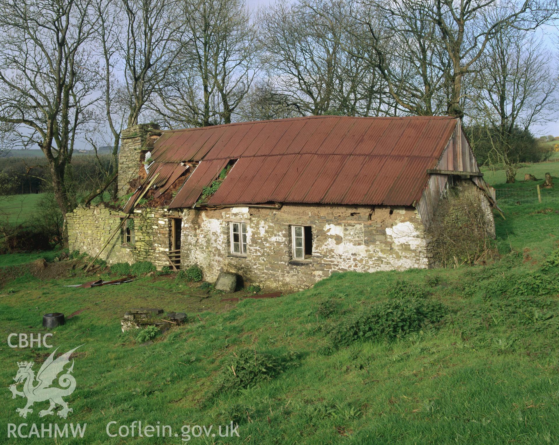 Colour transparency showing an exterior view of Ynys-Felen, Ceredigion , produced by Iain Wright, June 2004.
