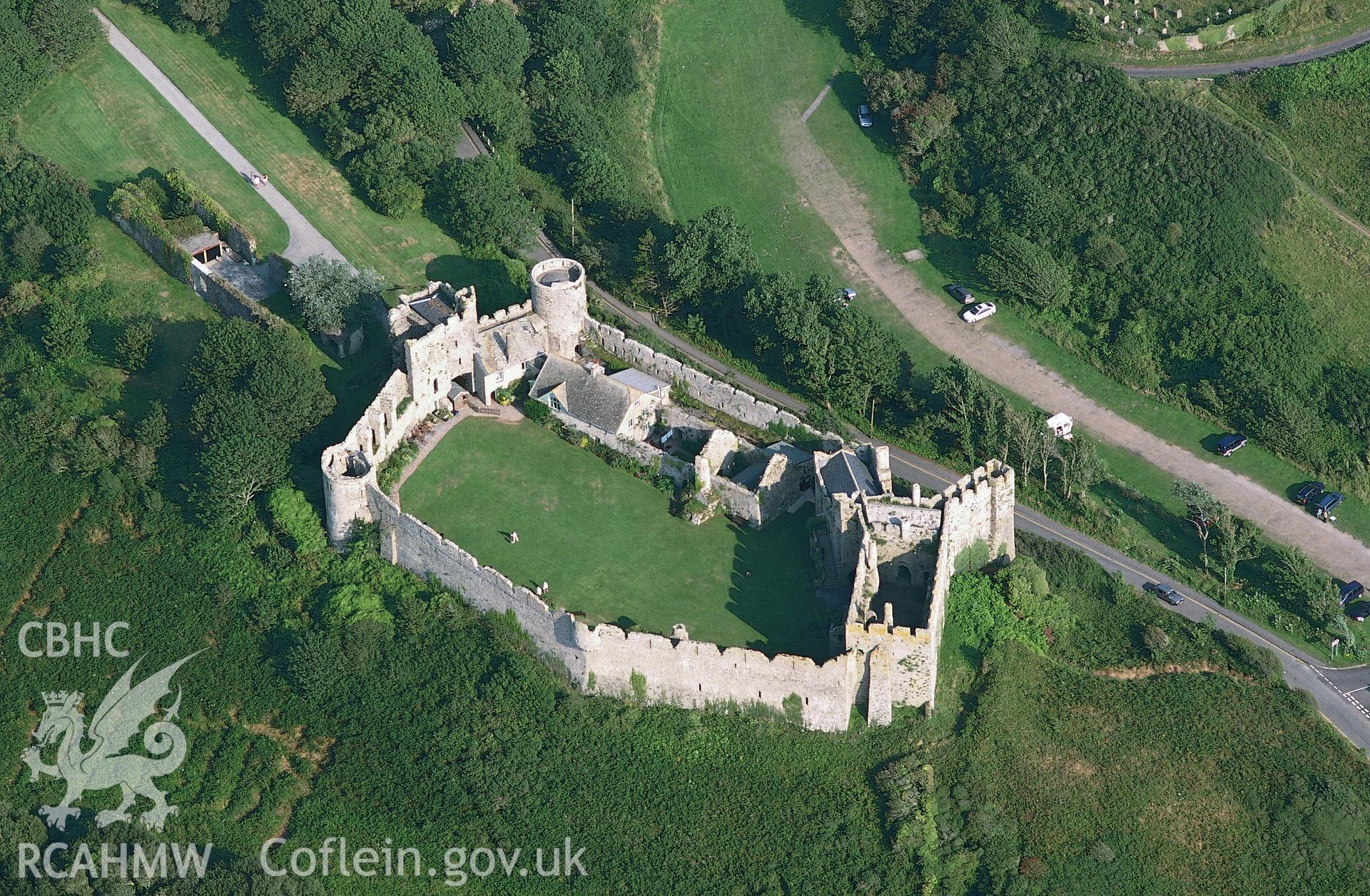 RCAHMW colour oblique aerial photograph of Manorbier Castle, low-level view. Taken by Toby Driver on 02/09/2002