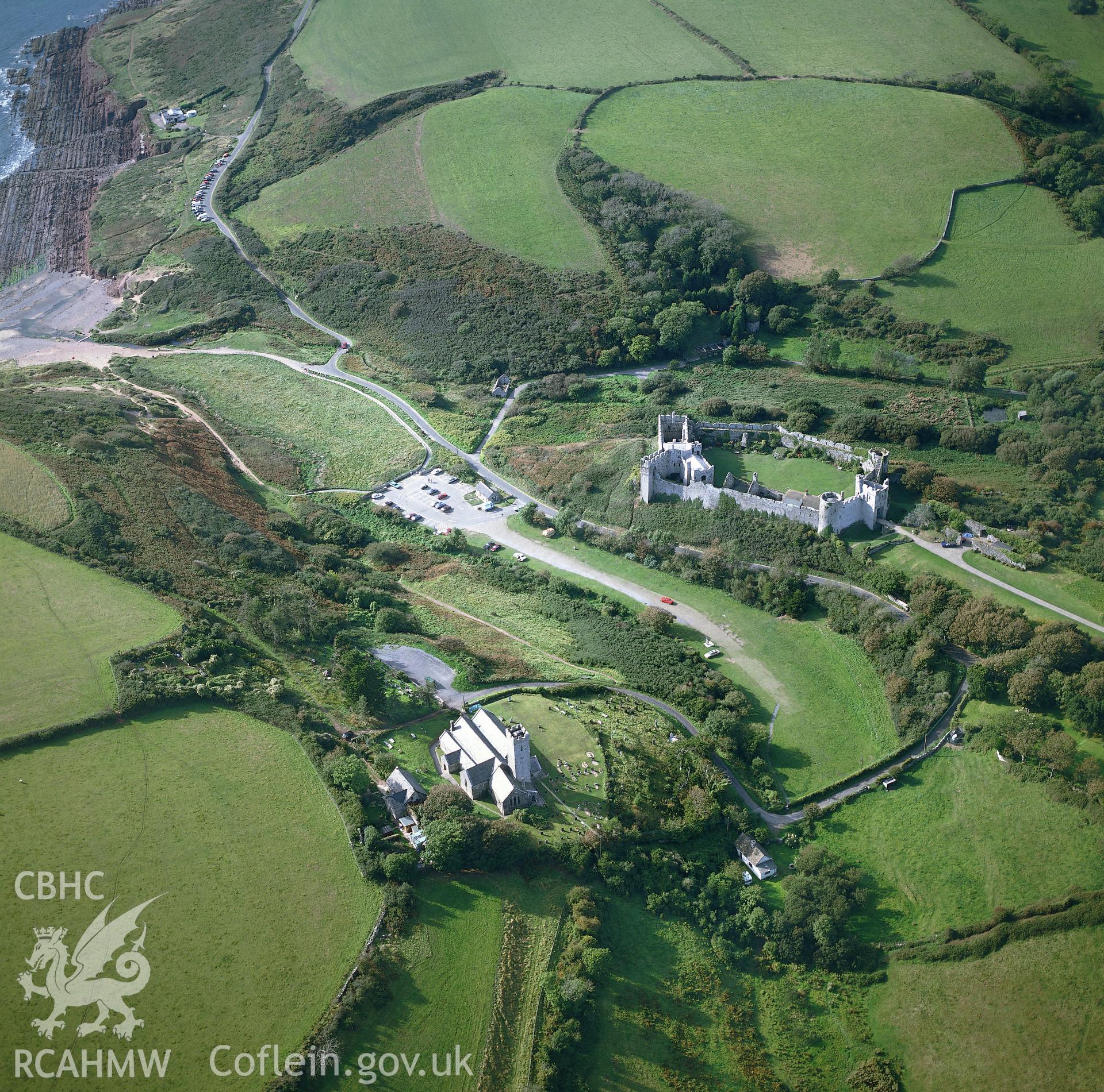RCAHMW colour oblique aerial photograph of Manorbier Castle. Taken by C R Musson 1990