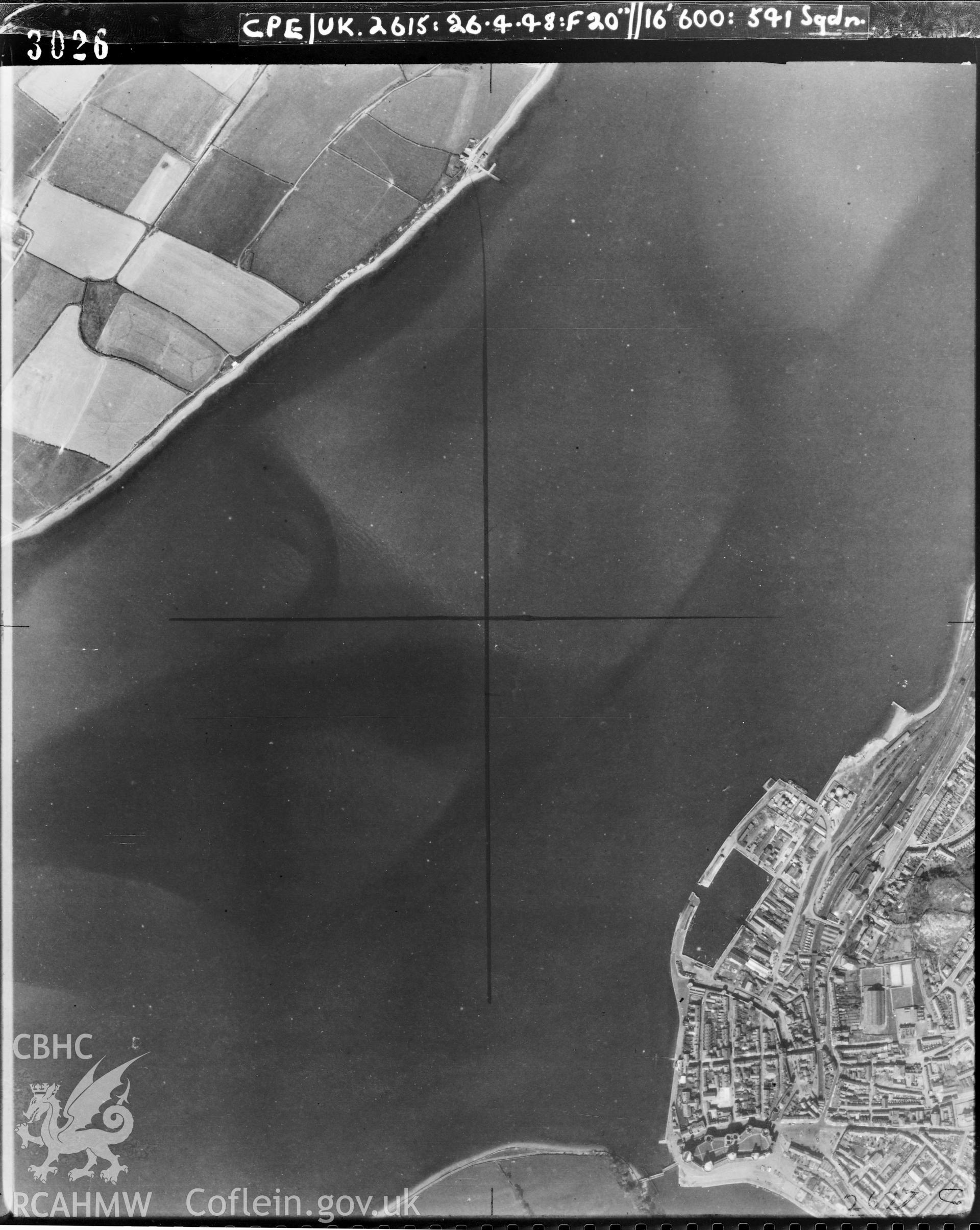 Black and white vertical aerial photograph taken by the RAF on 26/04/1948, picturing Caernarfon, at a scale of 1:10000. The photograph includes part of Rhosyr community on the Isle of Anglesey.