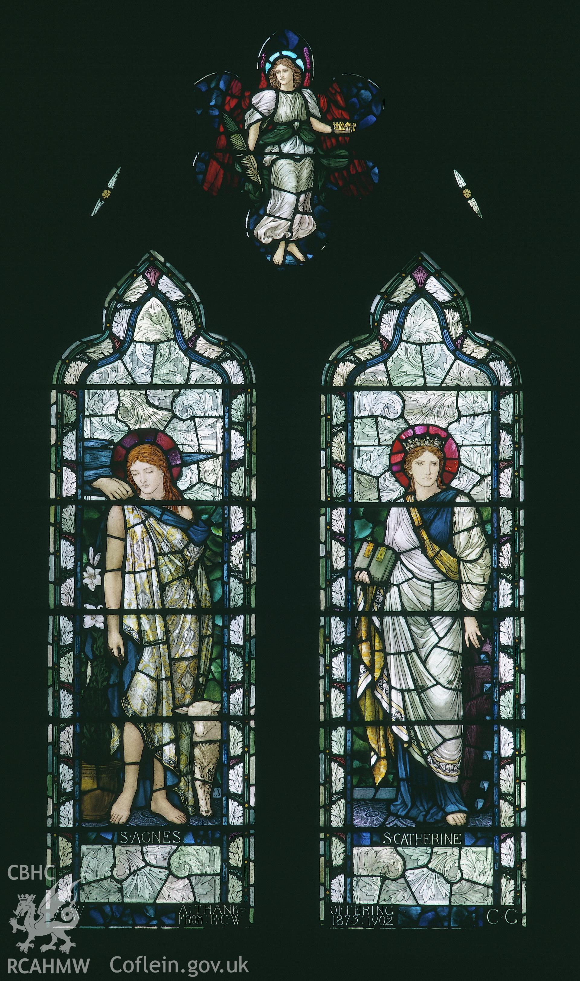 RCAHMW colour transparency of an iInterior view of a stained glass window at Hawarden Church designed by Edward Burne-Jones, depicting Saint Agnes and Saint Catherine.