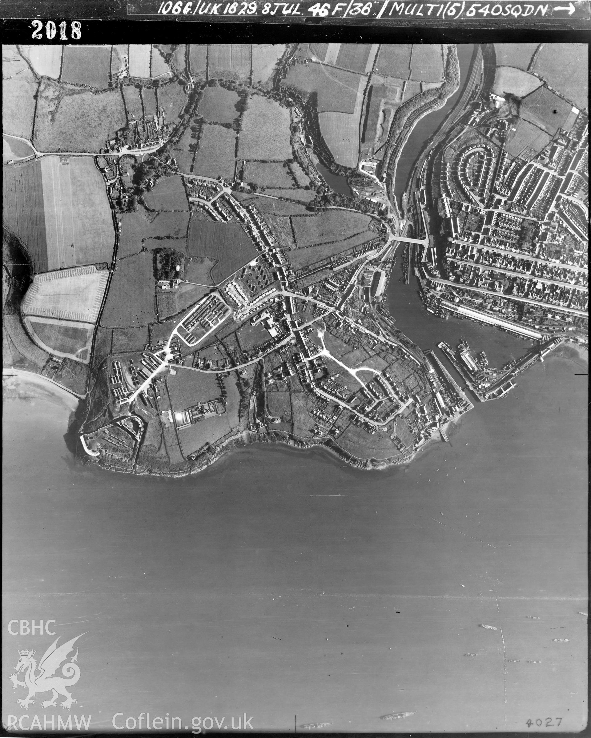 Black and white vertical aerial photograph taken by the RAF on 08/07/1946 centred on SM89570566 at a scale of 1:10000. The photograph includes part of Milford Haven community in Pembrokeshire.