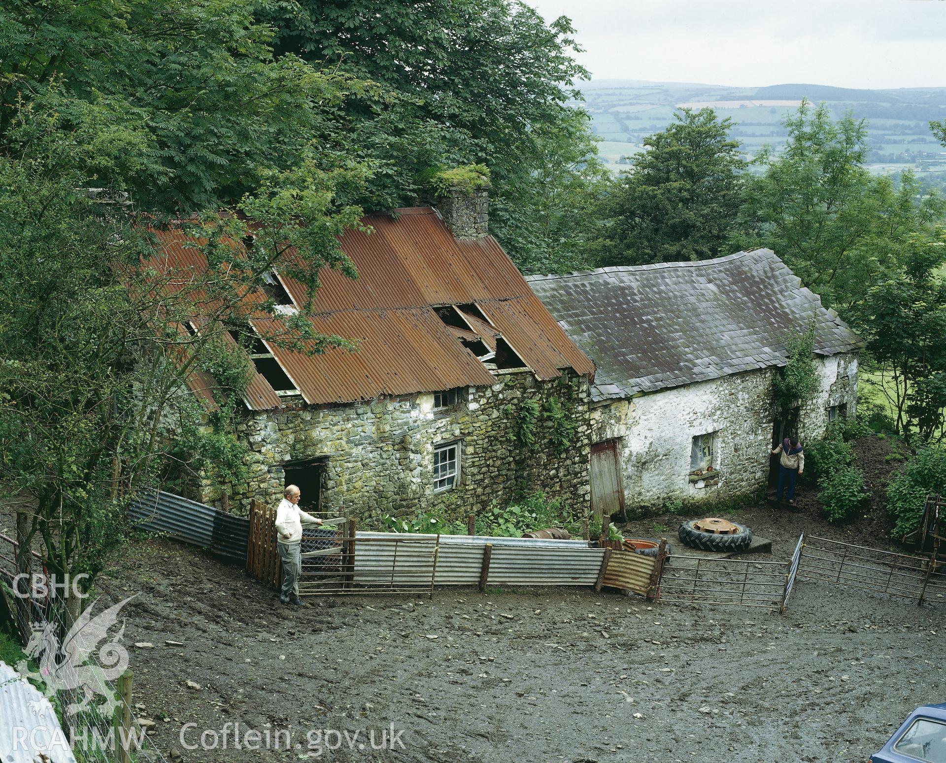 RCAHMW colour transparency showing view of Llethi, Talley, with Peter Smith in foreground.
