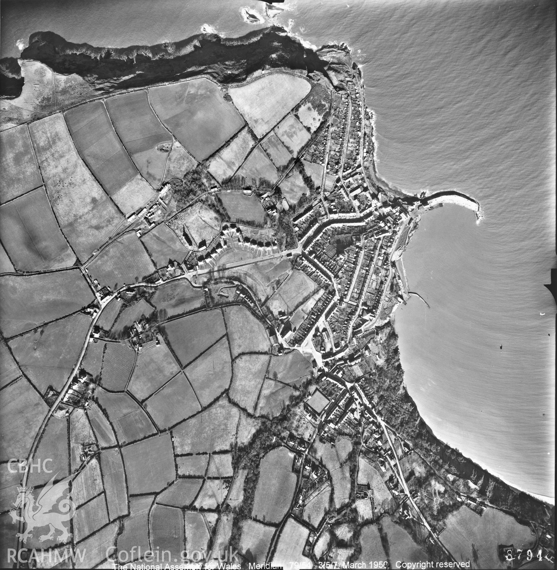 Black and white vertical aerial photograph taken by the RAF on 1954 centred on New Quay at a scale of 1:10000.