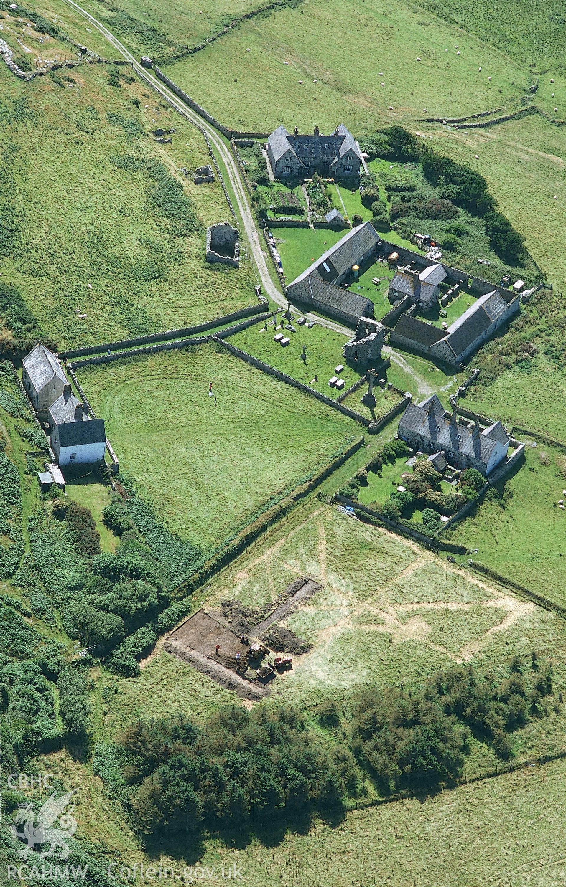 RCAHMW colour oblique aerial photograph of St Mary's Abbey, Bardsey island taken on 15/08/2002 by Toby Driver