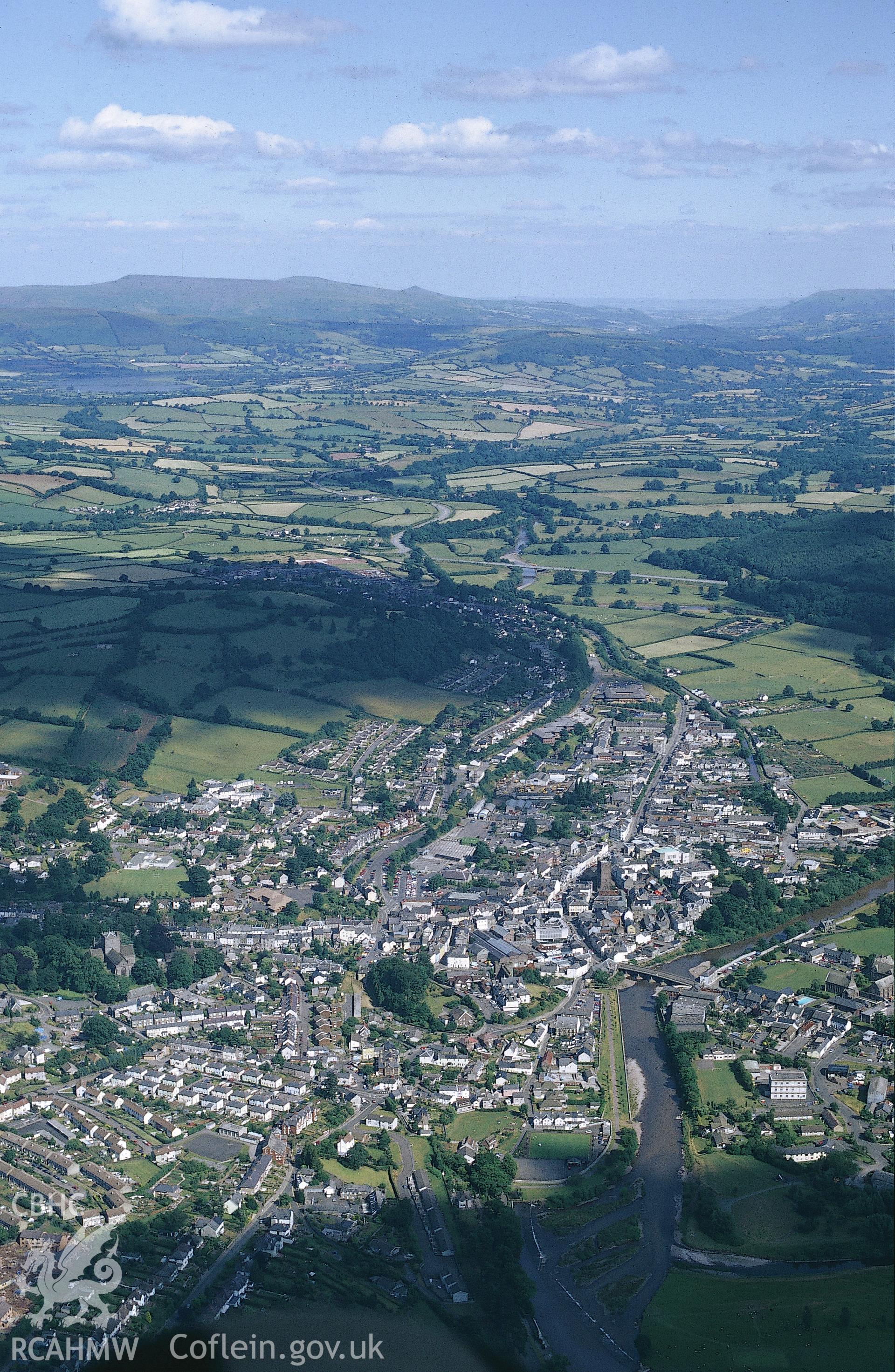 Slide of RCAHMW colour oblique aerial photograph of aerial view of Brecon Town, taken by C.R. Musson, 1989.