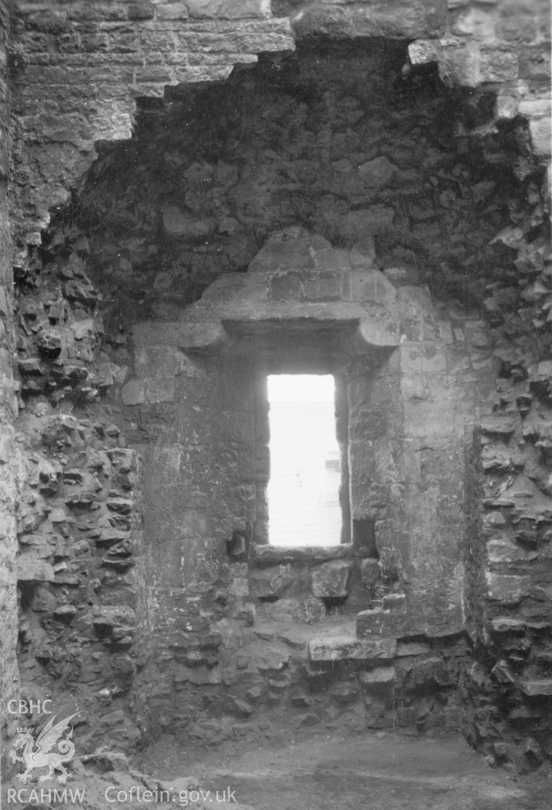 Black and white negative of Denbigh Town Walls.
