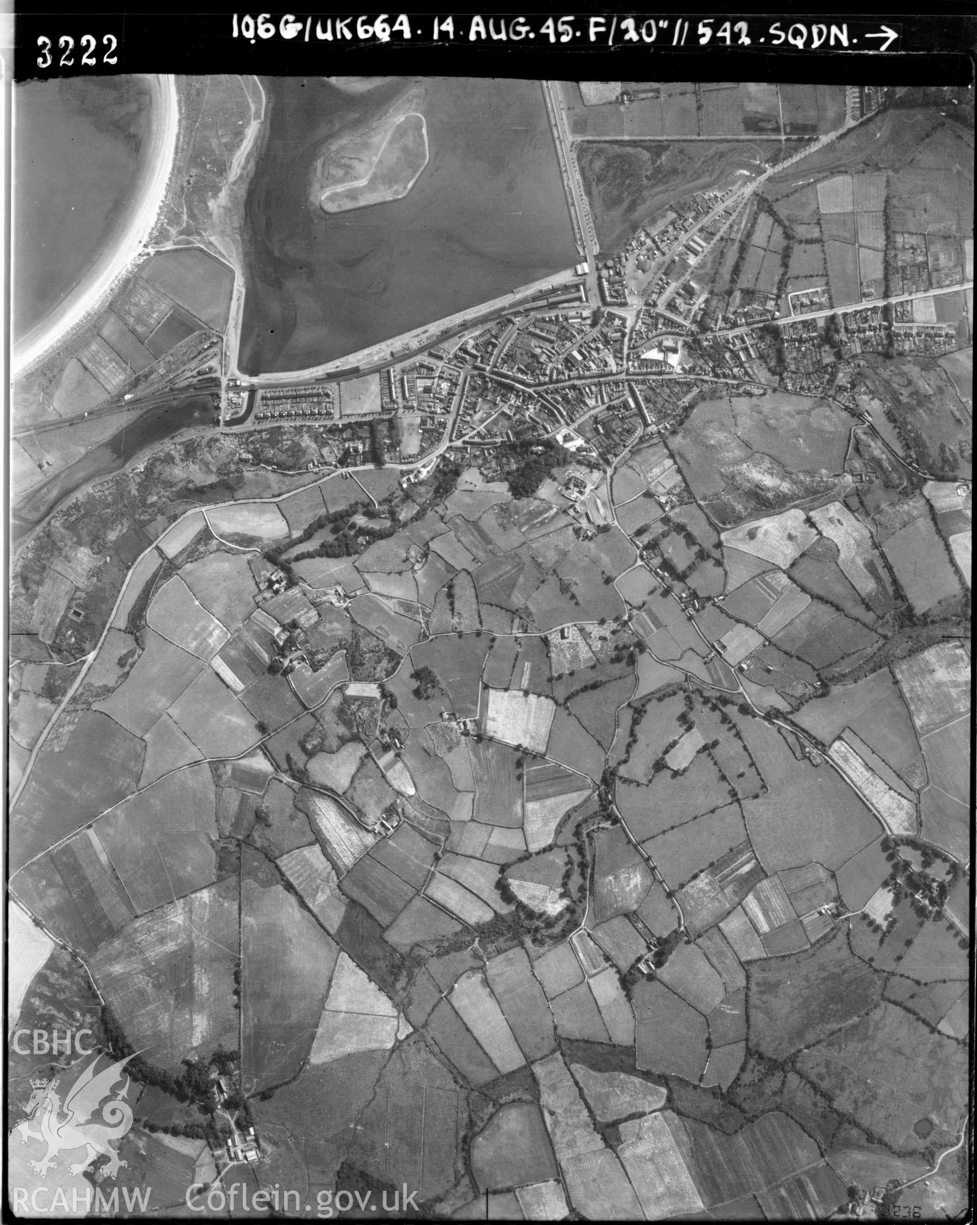 Black and white vertical aerial photograph taken by the RAF on 14/08/1945 centred on SH37583582 at a scale of 1:10000. The photograph includes part of Pwllheli community in Gwynedd.