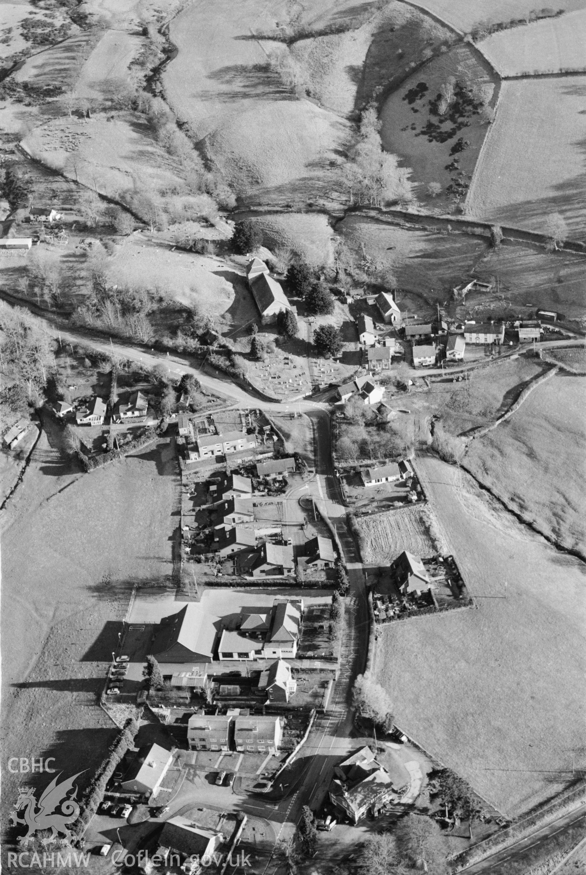 RCAHMW black and white oblique aerial photograph of view of Llanbister, 2001.