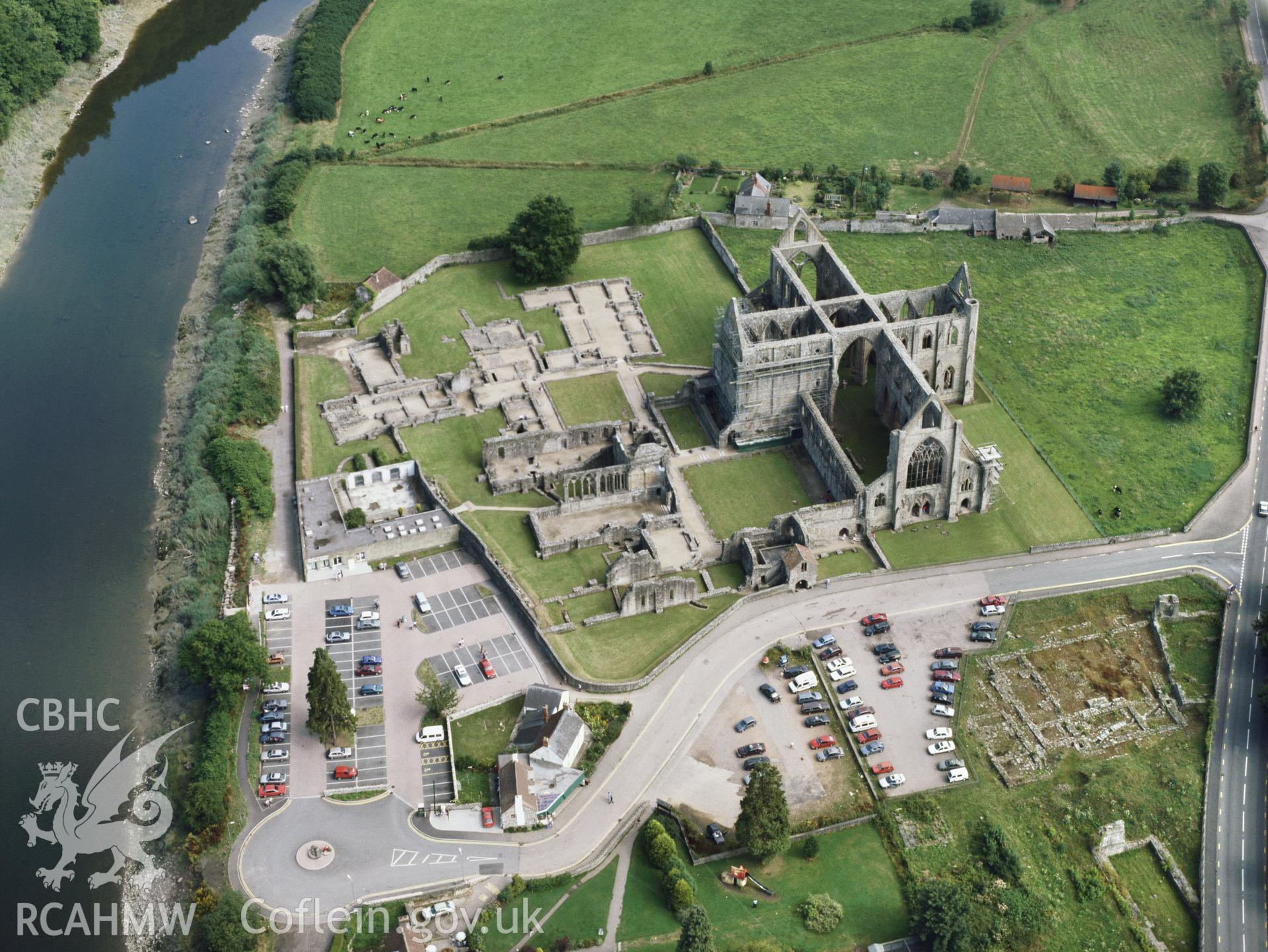 RCAHMW colour oblique aerial photograph of Tintern Abbey, taken by C.R. Musson, 05/08/94