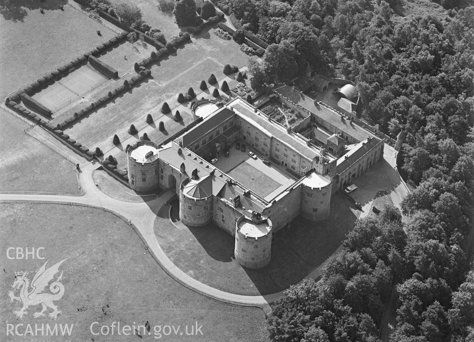 RCAHMW black and white oblique aerial photograph of Chirk Castle, taken by C R Musson, 04/08/1996.