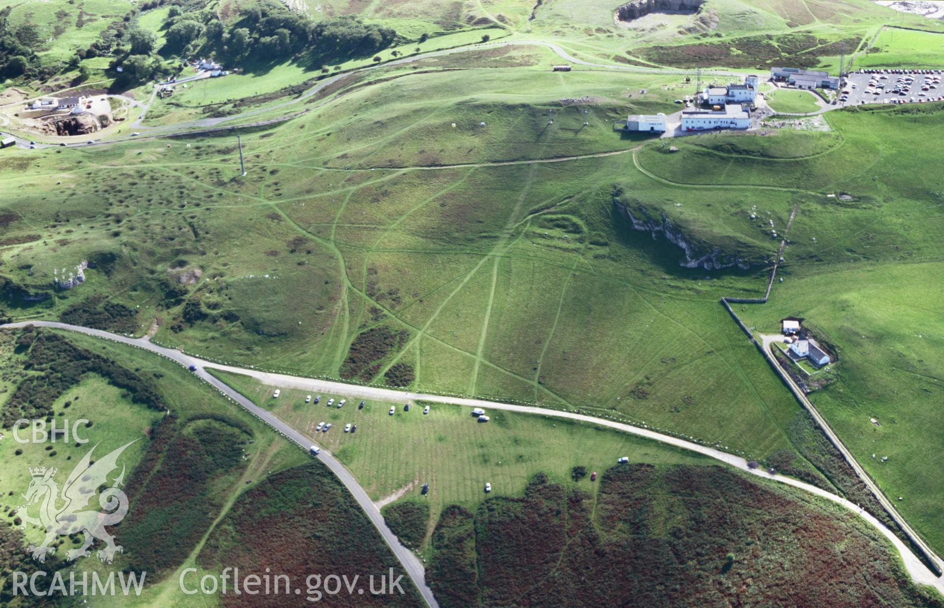 RCAHMW colour oblique aerial photograph showing Great Orme, taken by Toby Driver 2004.