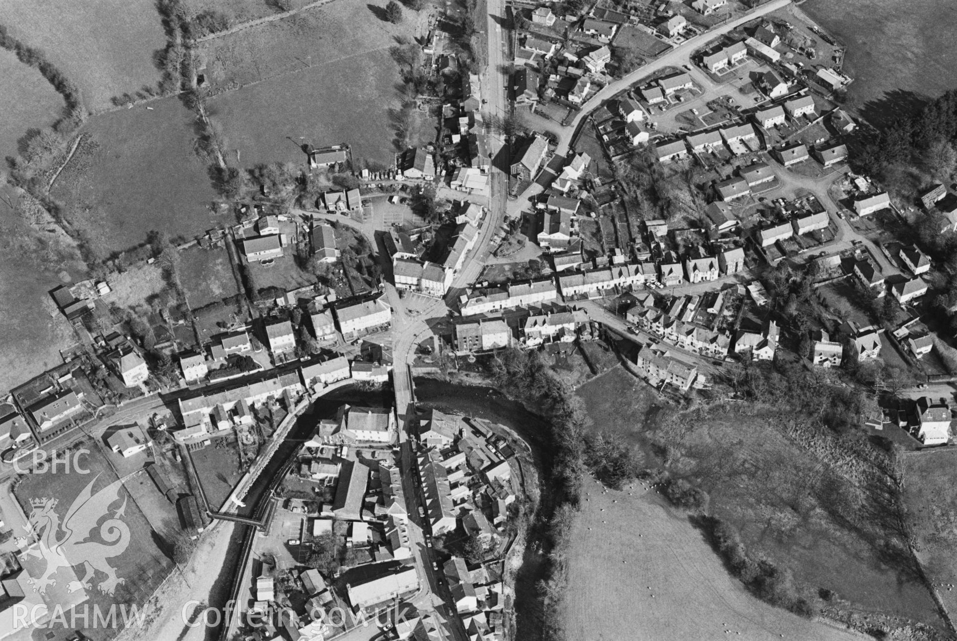 RCAHMW Black and white oblique aerial photograph of Llanwrtyd Wells, by Toby Driver, 2001.