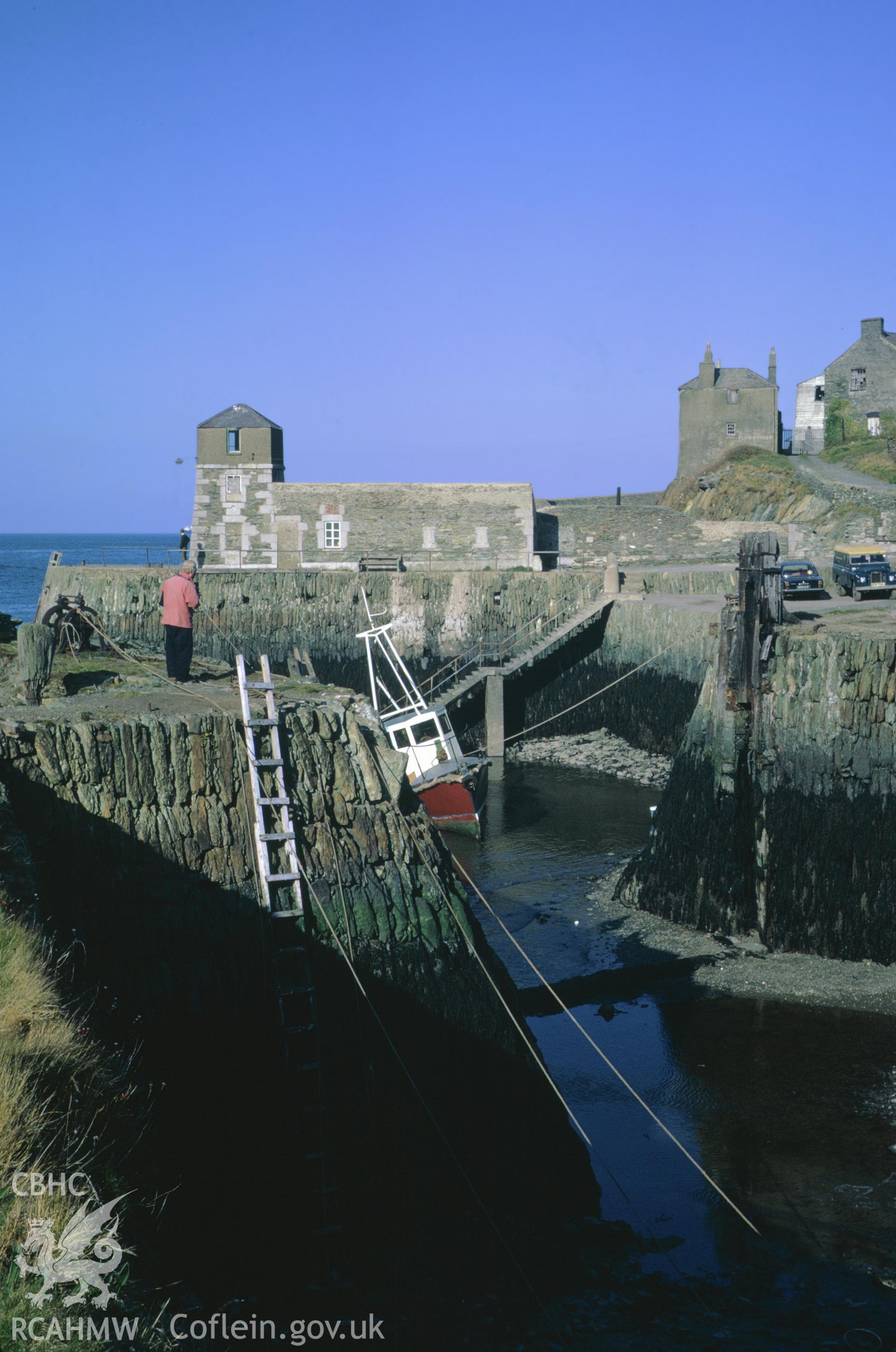 35mm colour slide showing  Inner Dock and Light at Amlwch Harbour, Anglesey by Dylan Roberts.