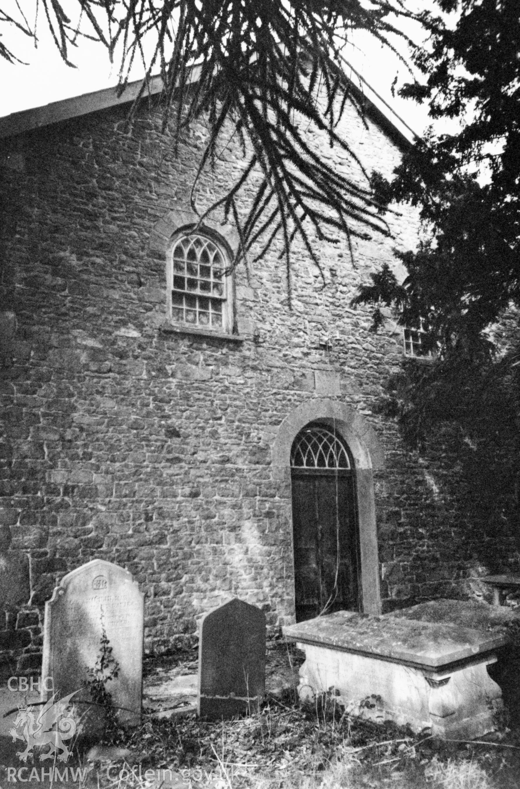 Digital copy of a black and white photograph showing an exterior view of Libanus Baptist Chapel, Llansadwrn, taken by Robert Scourfield, 1996.
