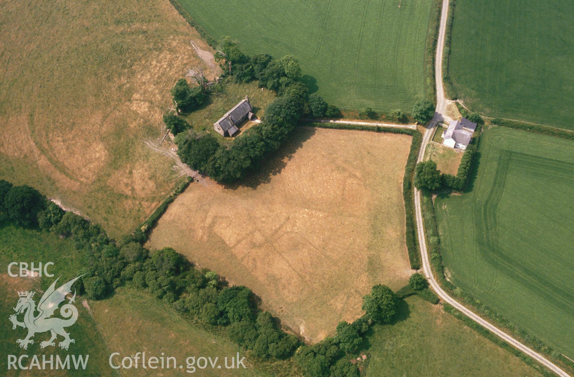 RCAHMW colour slide oblique aerial photograph of St Canna's, Henllanfallteg, taken on 27/06/1992 by CR Musson