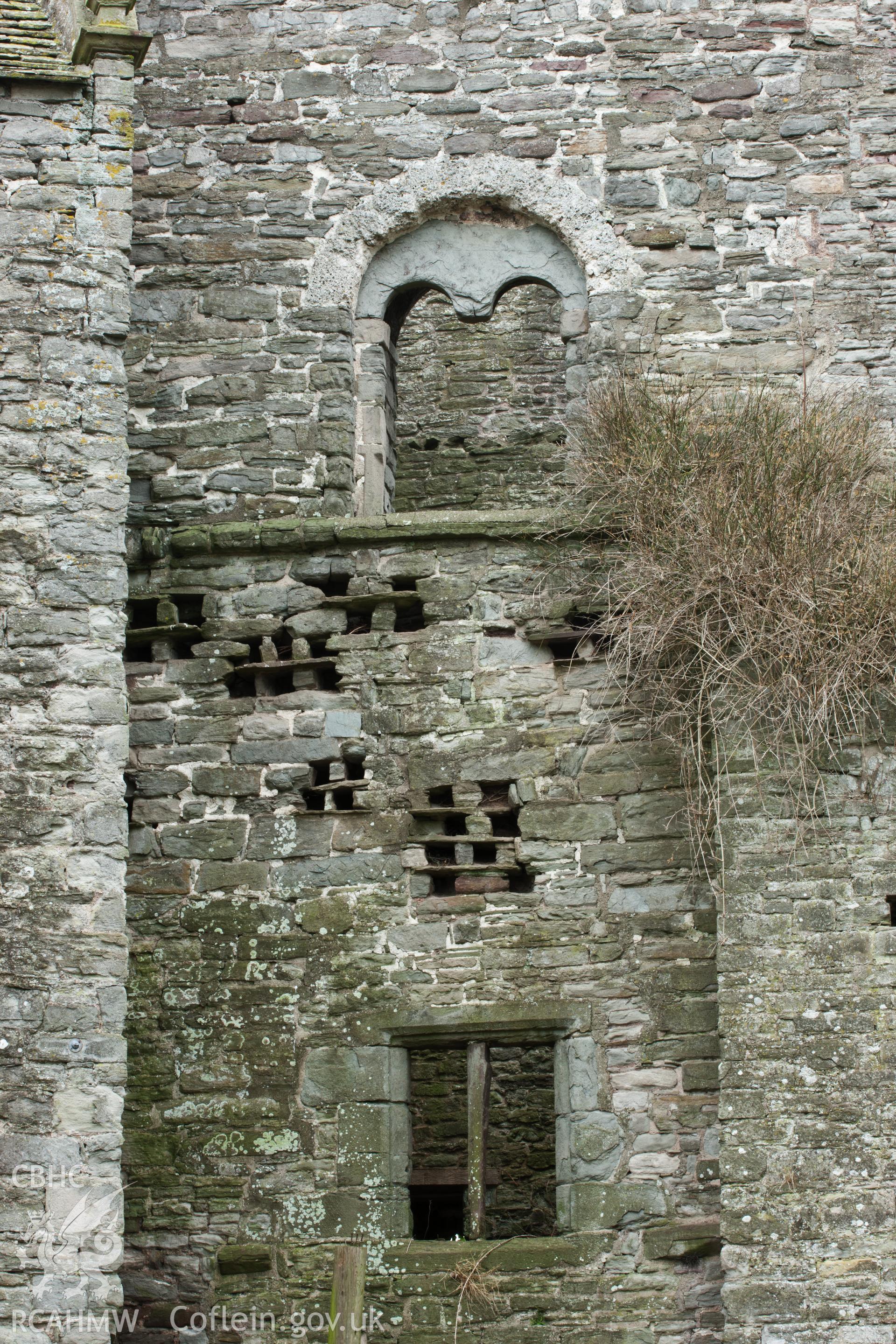 Detail of arched window and pigeon roosts in Keep.