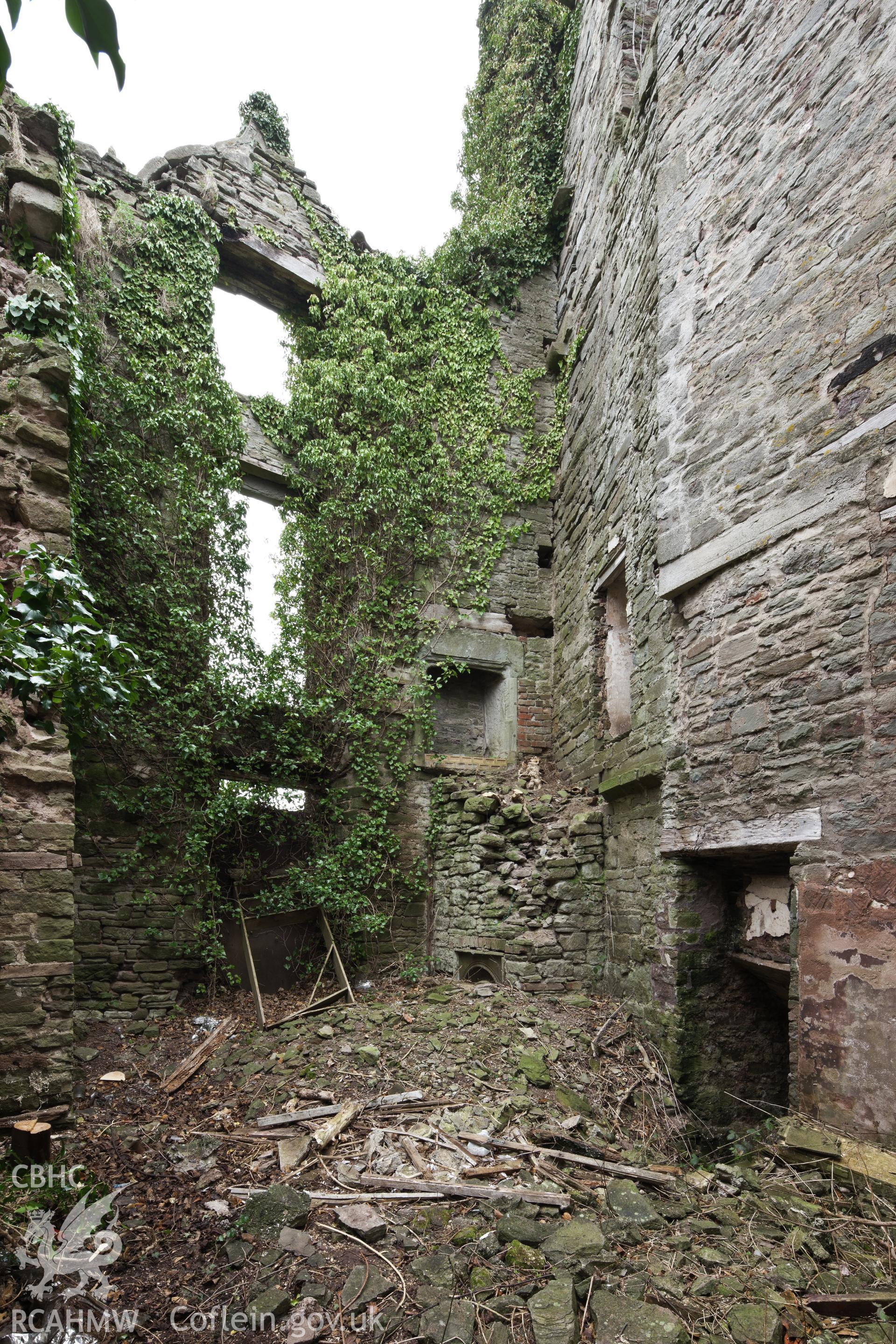 Groundfloor view of ruined hall and study, from the south.