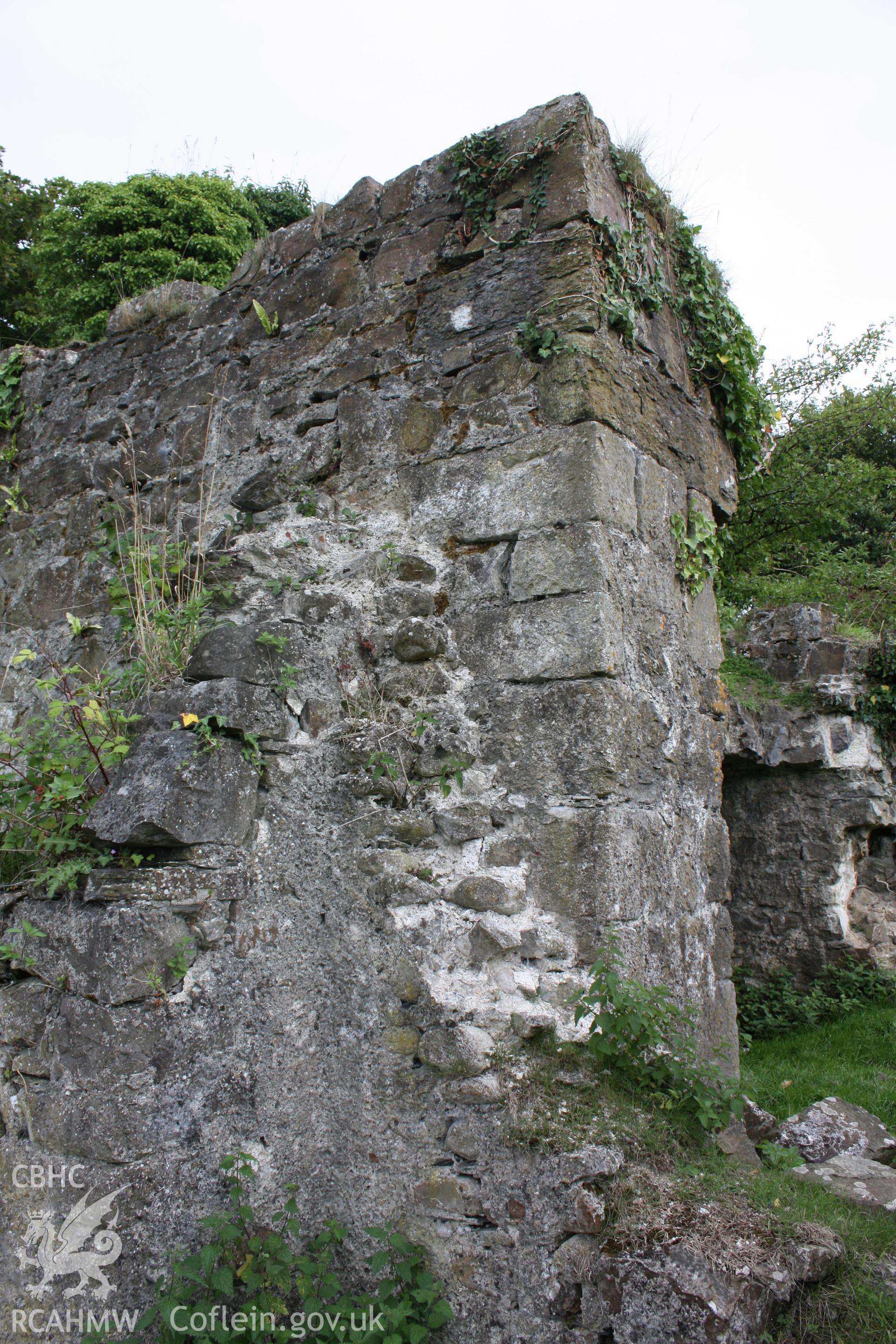 This photograph shows where the inner courtyard wall laps onto the wall of the Stewards Tower. Rubble core of rounded stone, showing these were collected from a river or costal area.
