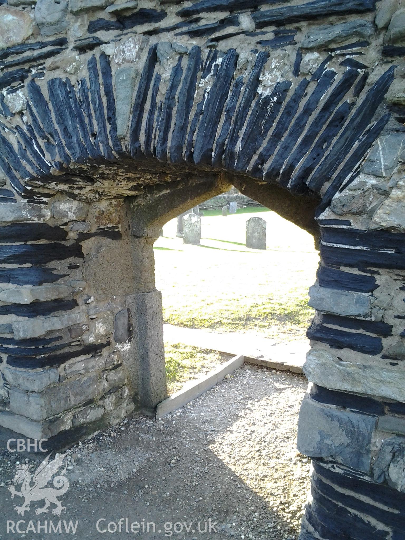 Arch of entrance to St Brynach's church viewed from the interior