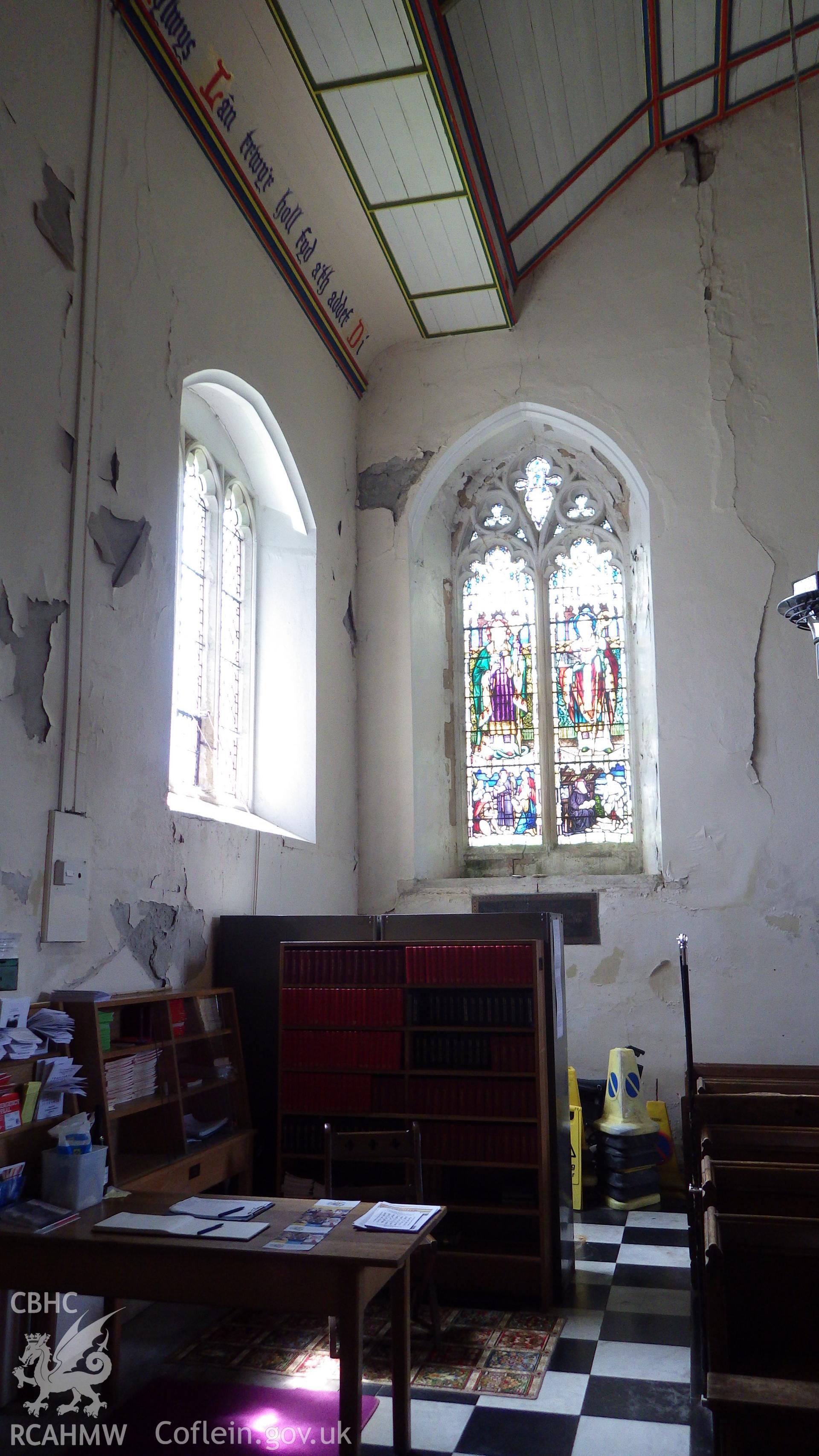 Water damage and cracking at western end of nave, southwest corner, also showing detailing of vaulted roof