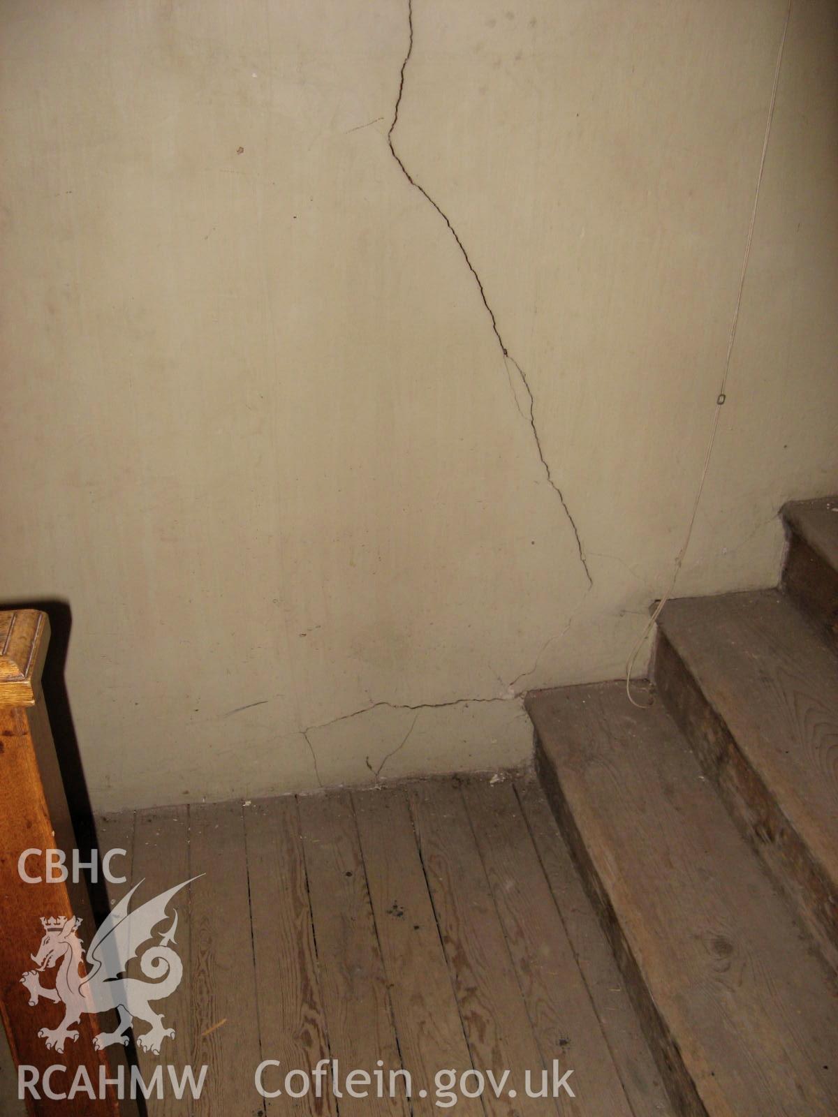 View of ground floor interior - wall plaster cracks