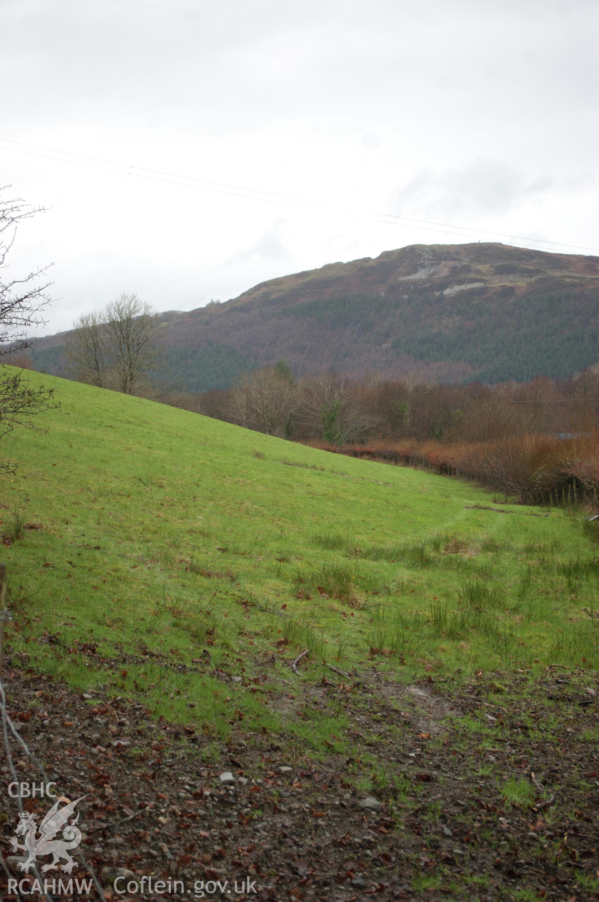 Marian Mawr archaeological assessment; section B-C, view from ESE showing view looking along pipeline route across field,  taken by Robert Evans of Gwynedd Archaeological Trust, 5th February 2016.