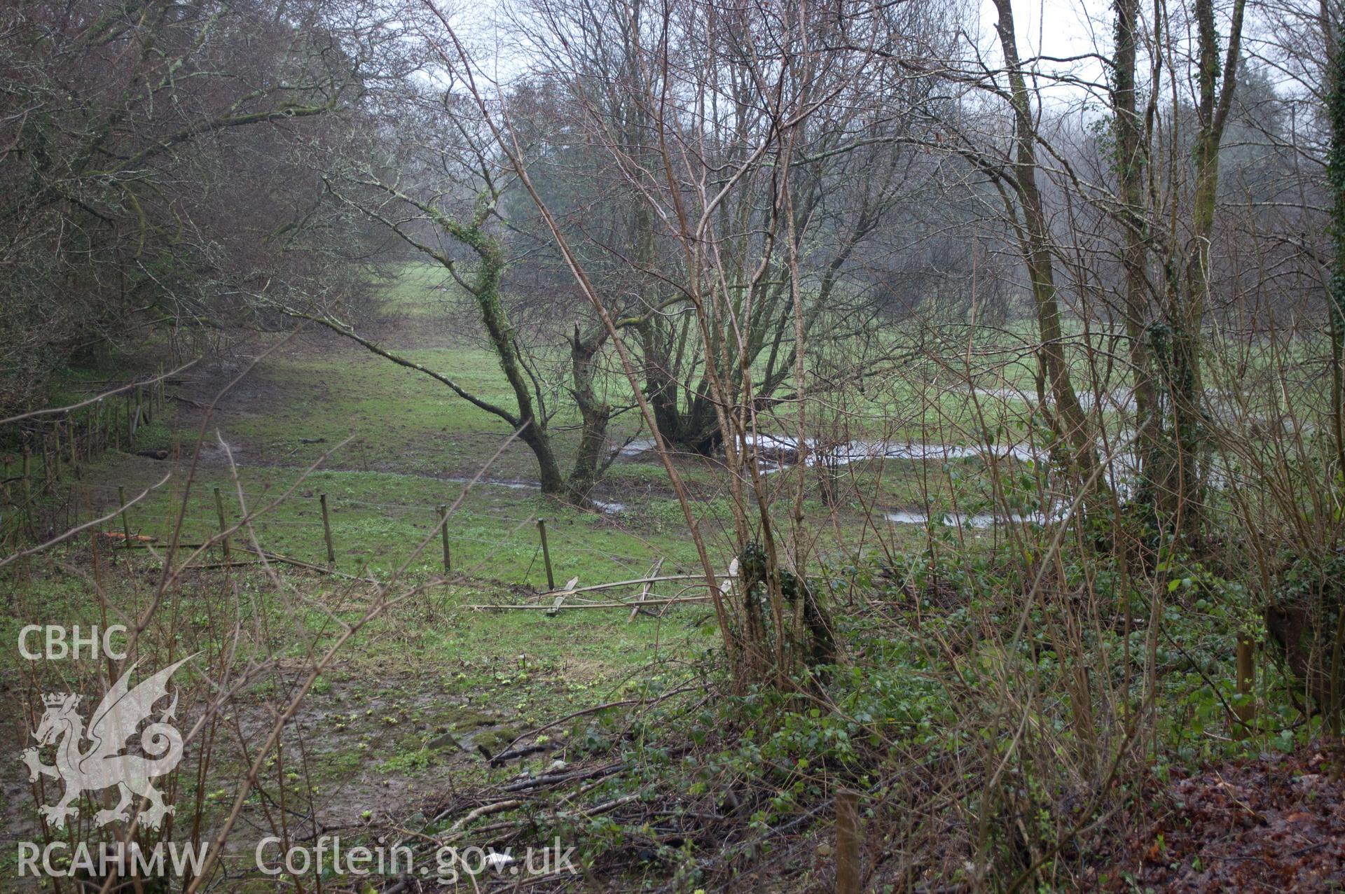 Marian Mawr archaeological assessment; section B-C, view from W showing view across low lying floodplain field showing pipe route, taken by Robert Evans of Gwynedd Archaeological Trust, 5th February 2016.