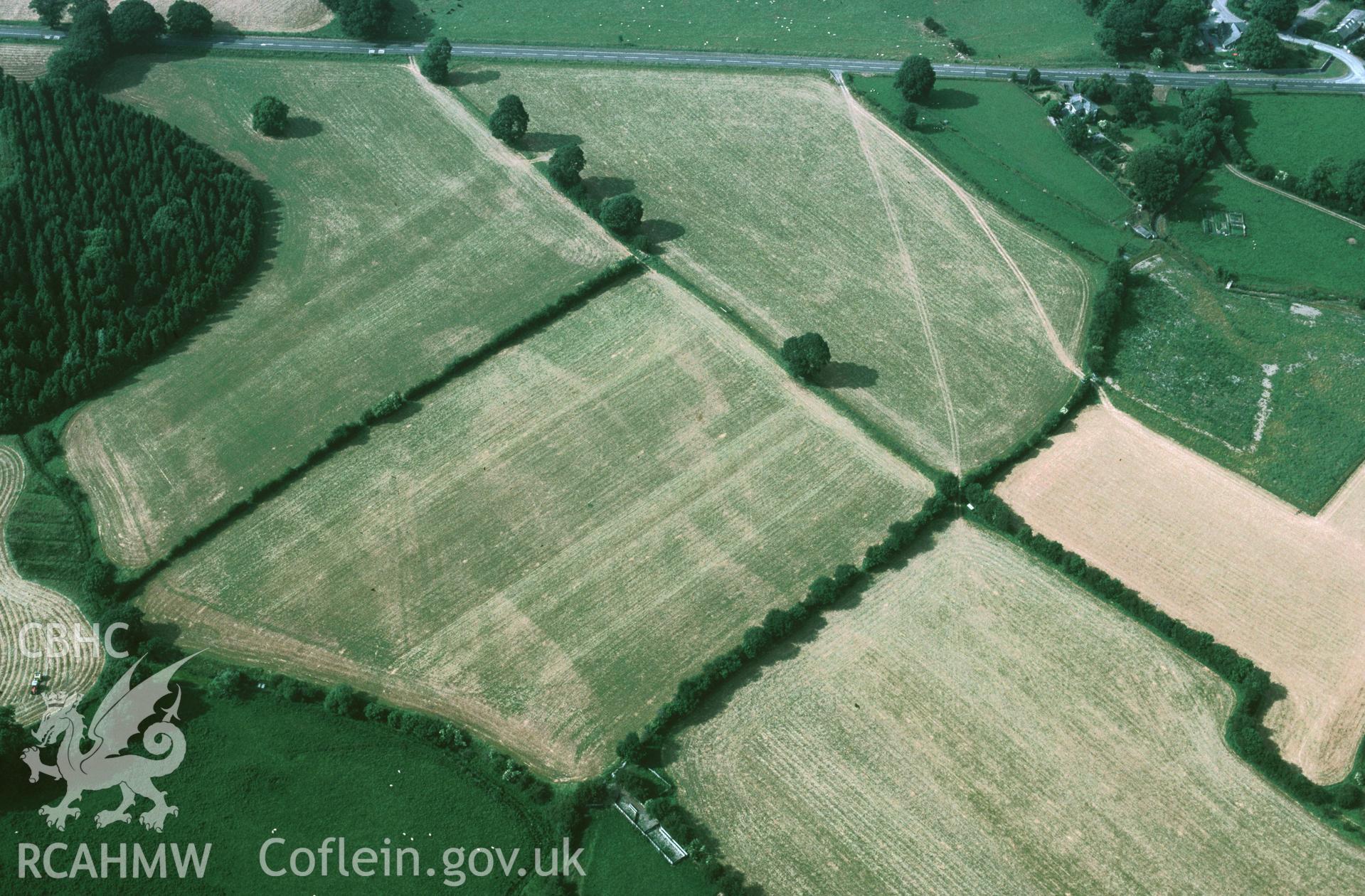 Slide of RCAHMW colour oblique aerial photograph of Llanfor Roman Forts, taken by C.R. Musson, 22/7/1996.