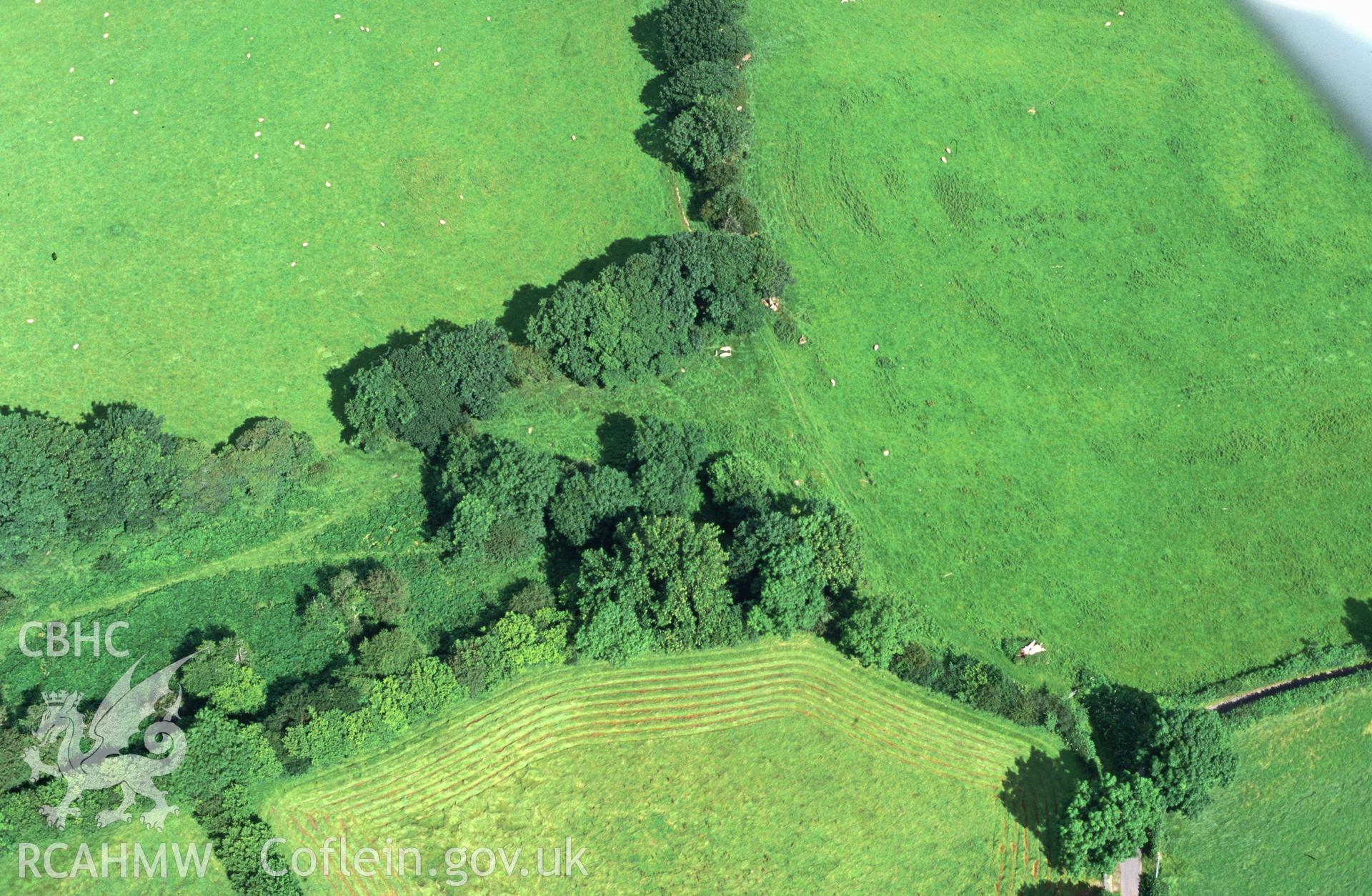 Slide of RCAHMW colour oblique aerial photograph of Pen-y-wyrlod Long Cairn, taken by T.G. Driver, 24/7/1998.