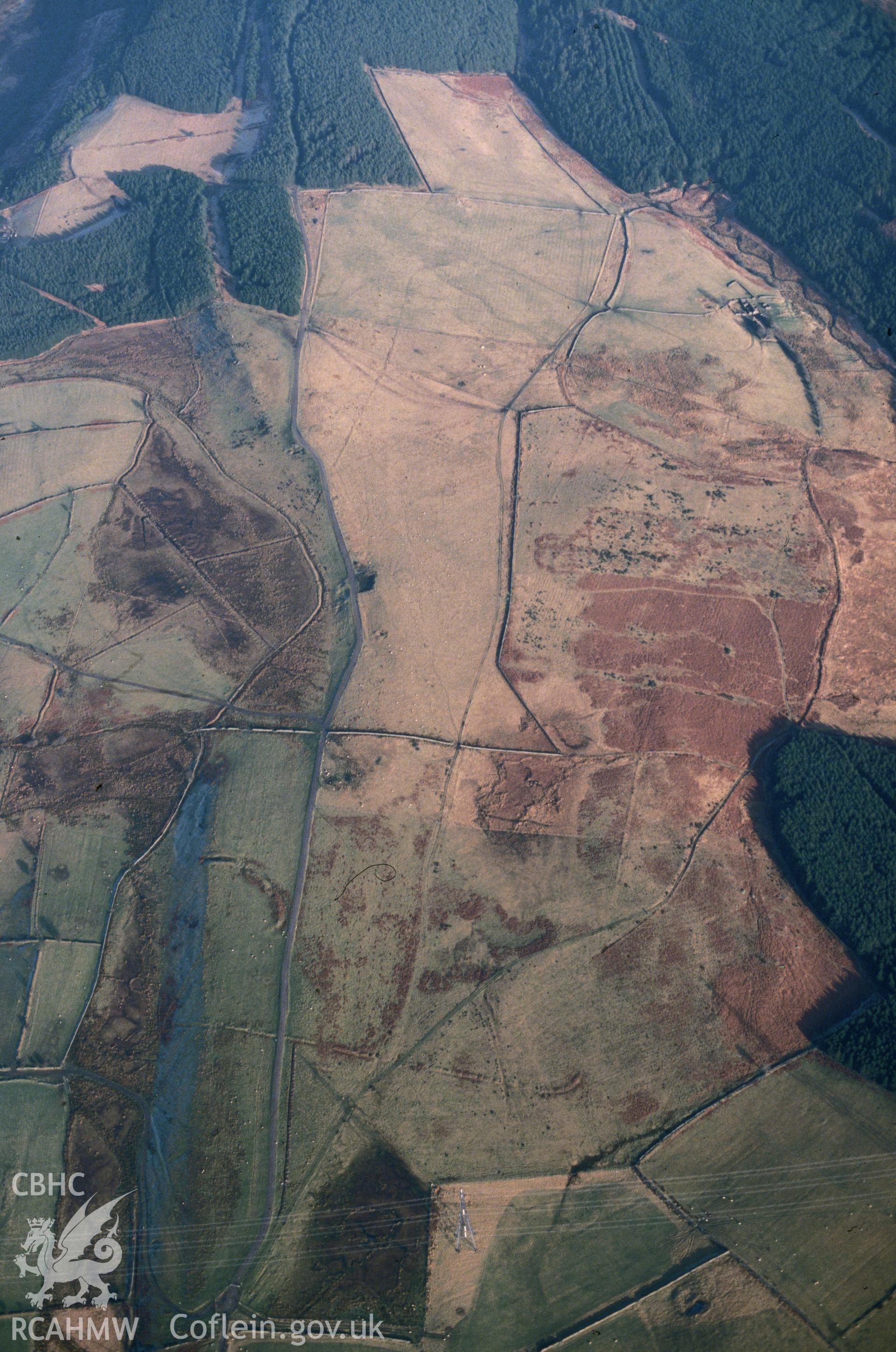 Slide of RCAHMW colour oblique aerial photograph of Blaen Cwm Bach Camp, taken by C.R. Musson, 27/1/1992.