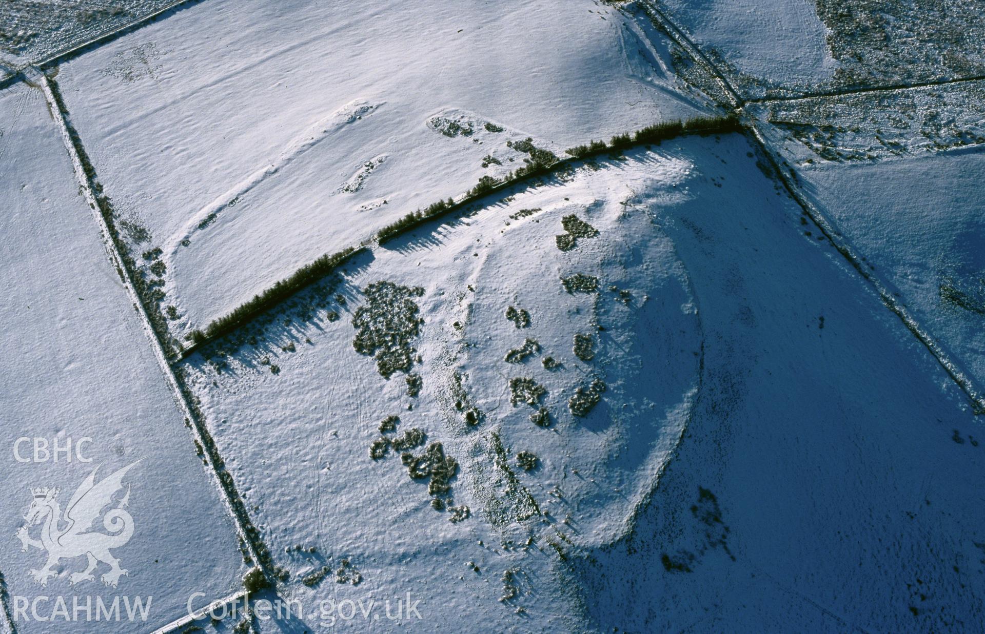 Slide of RCAHMW colour oblique aerial photograph of Caer Cadwgan, taken by T.G. Driver, 19/12/1999.