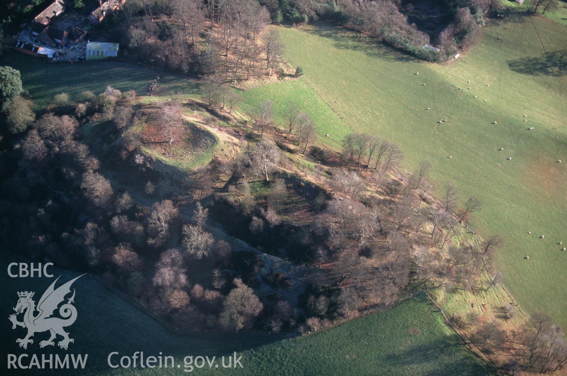 Slide of RCAHMW colour oblique aerial photograph of Cefn Brytalch, Castle, taken by C.R. Musson, 20/12/1998.