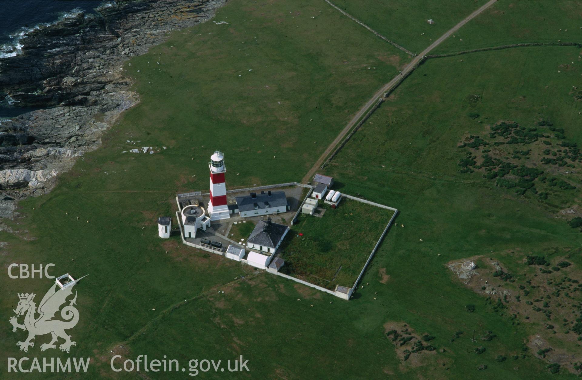 Slide of RCAHMW colour oblique aerial photograph of Bardsey Island Lighthouse, taken by C.R. Musson, 27/7/1996.