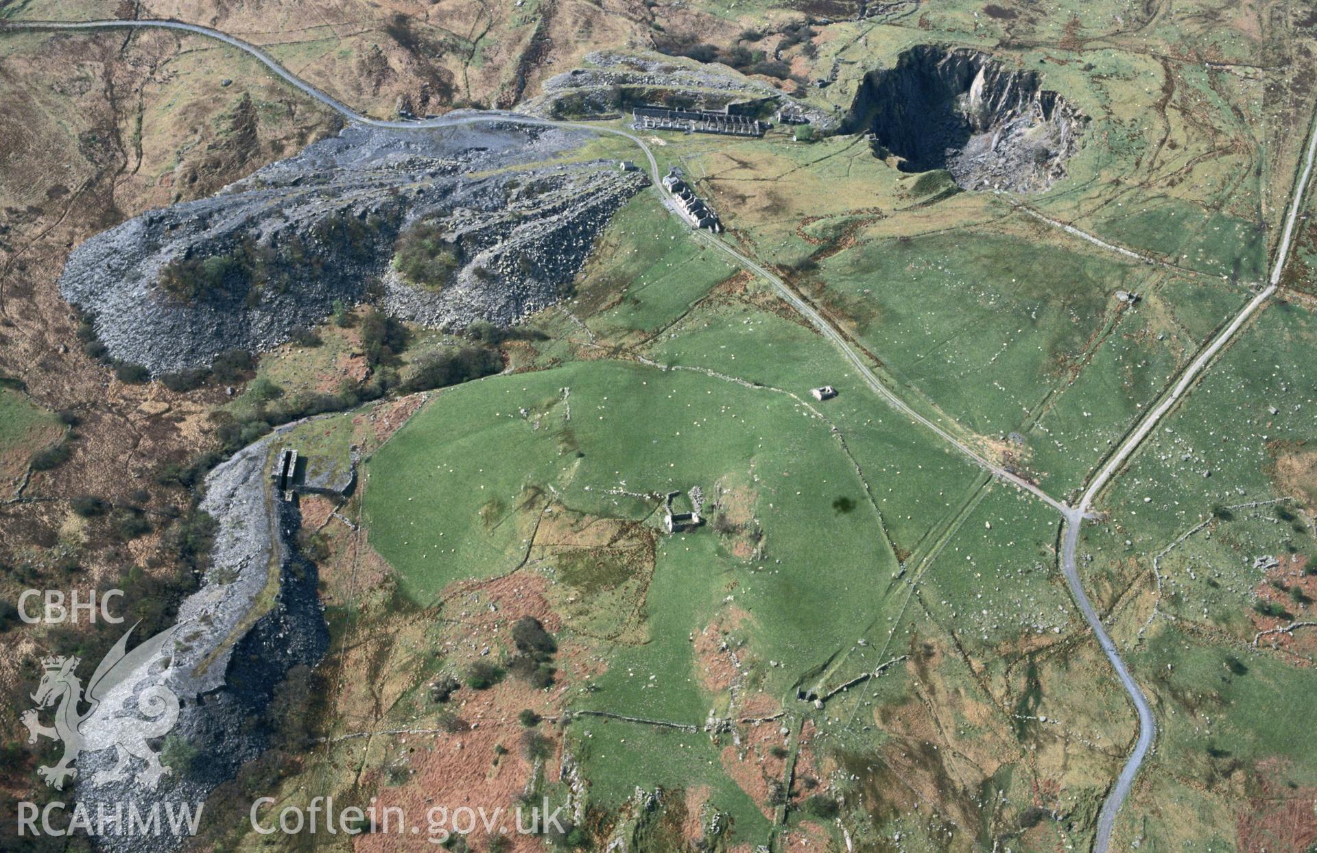 RCAHMW colour slide oblique aerial photograph of Rhos Quarry (Slate and Slab Works), Capel Curig, taken by C.R. Musson, 01/05/94