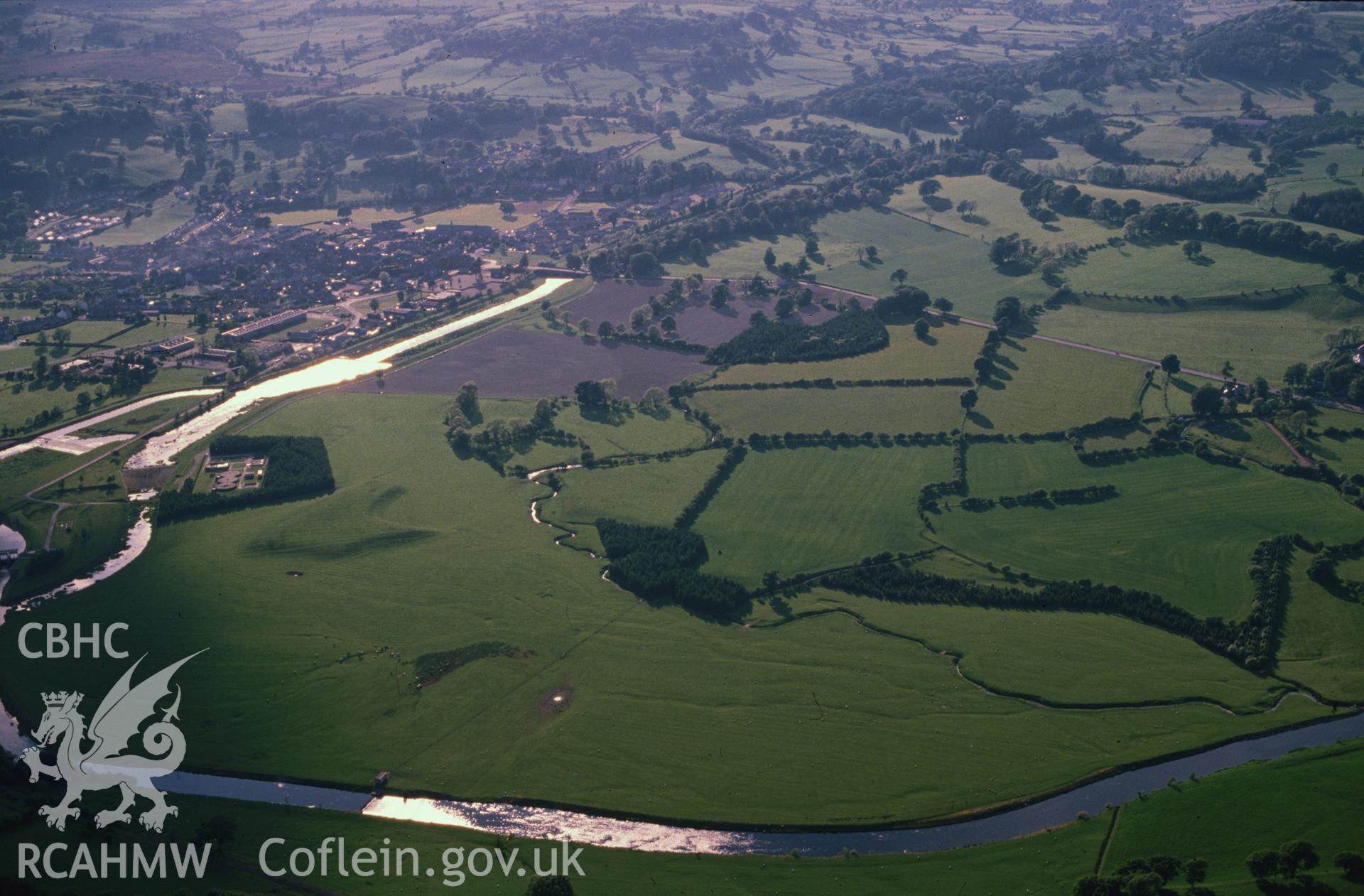 Slide of RCAHMW colour oblique aerial photograph of Llanfor Roman Forts, taken by C.R. Musson, 7/6/1989.
