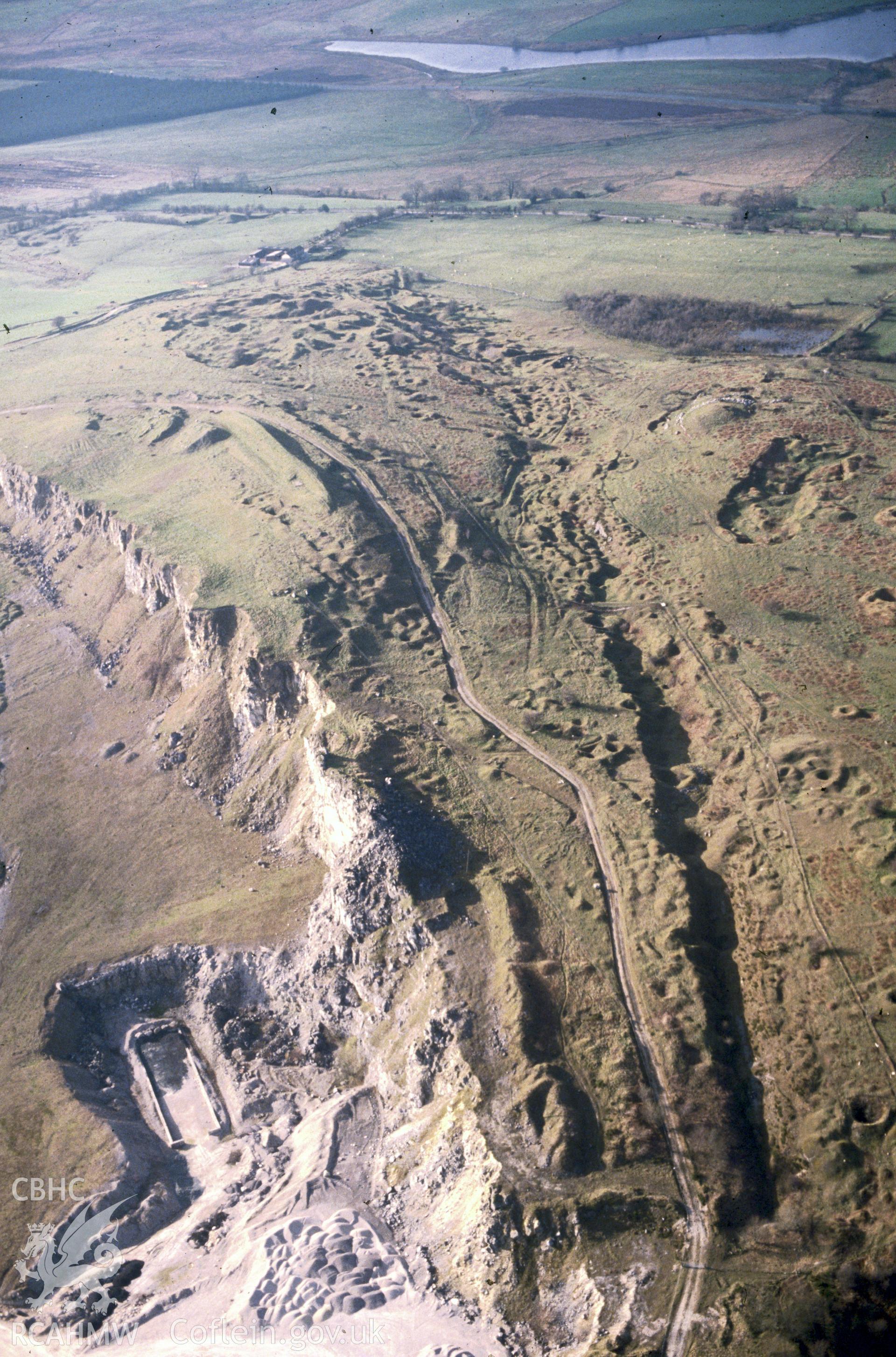 Slide of RCAHMW colour oblique aerial photograph of Esclusham Mountain Lead Mines, taken by C.R. Musson, 12/3/1990.