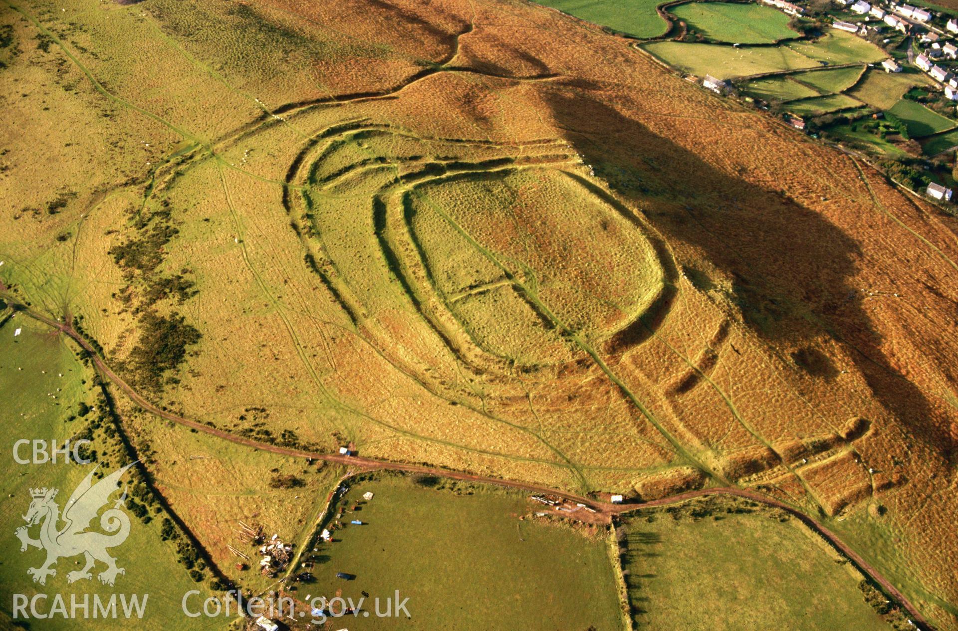 Slide of RCAHMW colour oblique aerial photograph of The Bulwark, Llanmadoc Hill, taken by C.R. Musson, 6/2/1988.