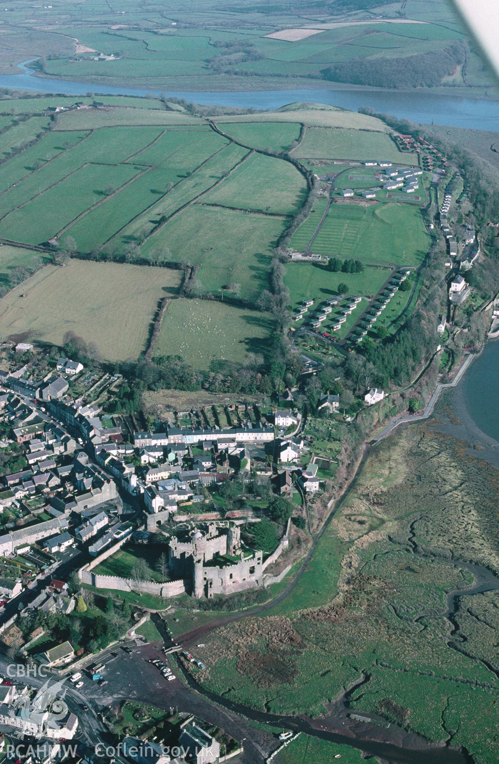 Slide of RCAHMW colour oblique aerial photograph of Laugharne, taken by C.R. Musson, 15/2/1997.