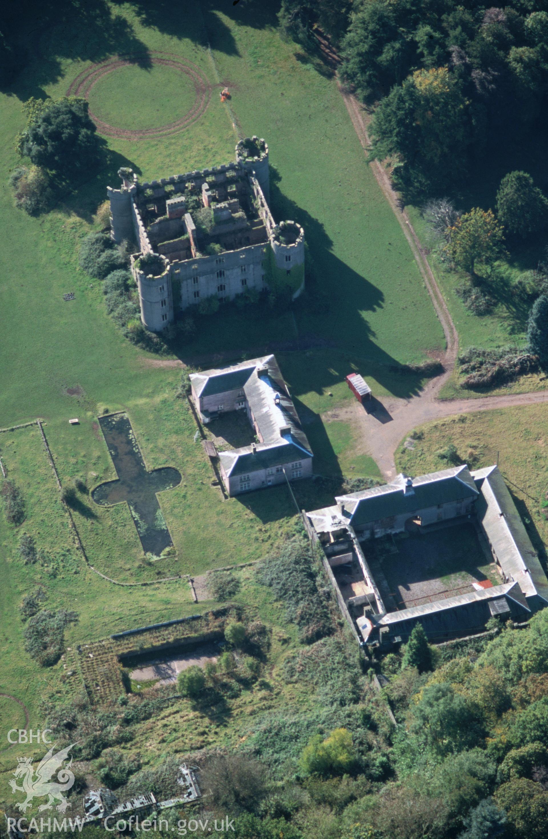 Slide of RCAHMW colour oblique aerial photograph of Ruperra Castle;rhiwperra, taken by T.G. Driver, 13/10/1999.