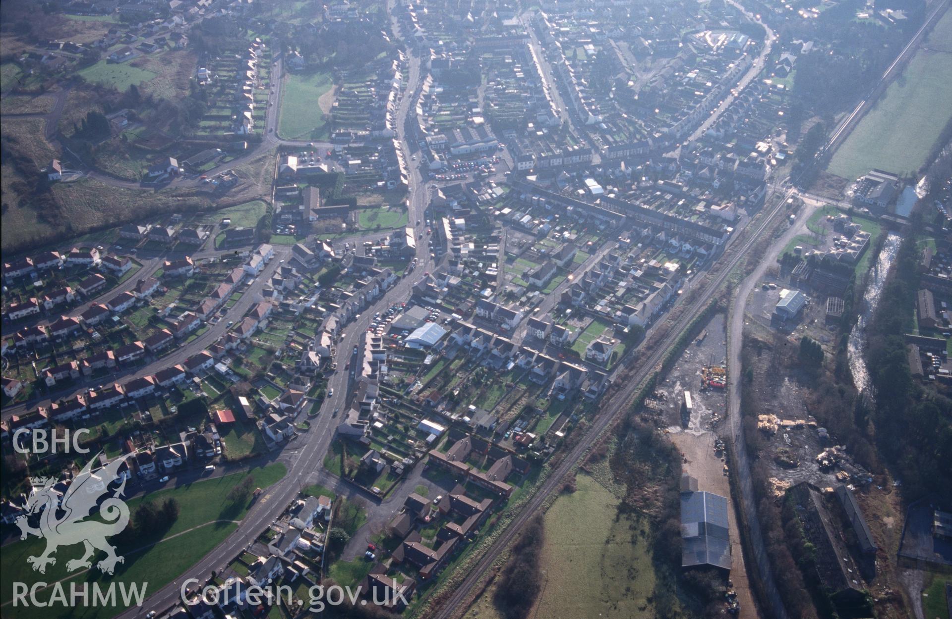Slide of RCAHMW colour oblique aerial photograph of Ammanford;rhydaman, taken by T.G. Driver, 28/1/1998.