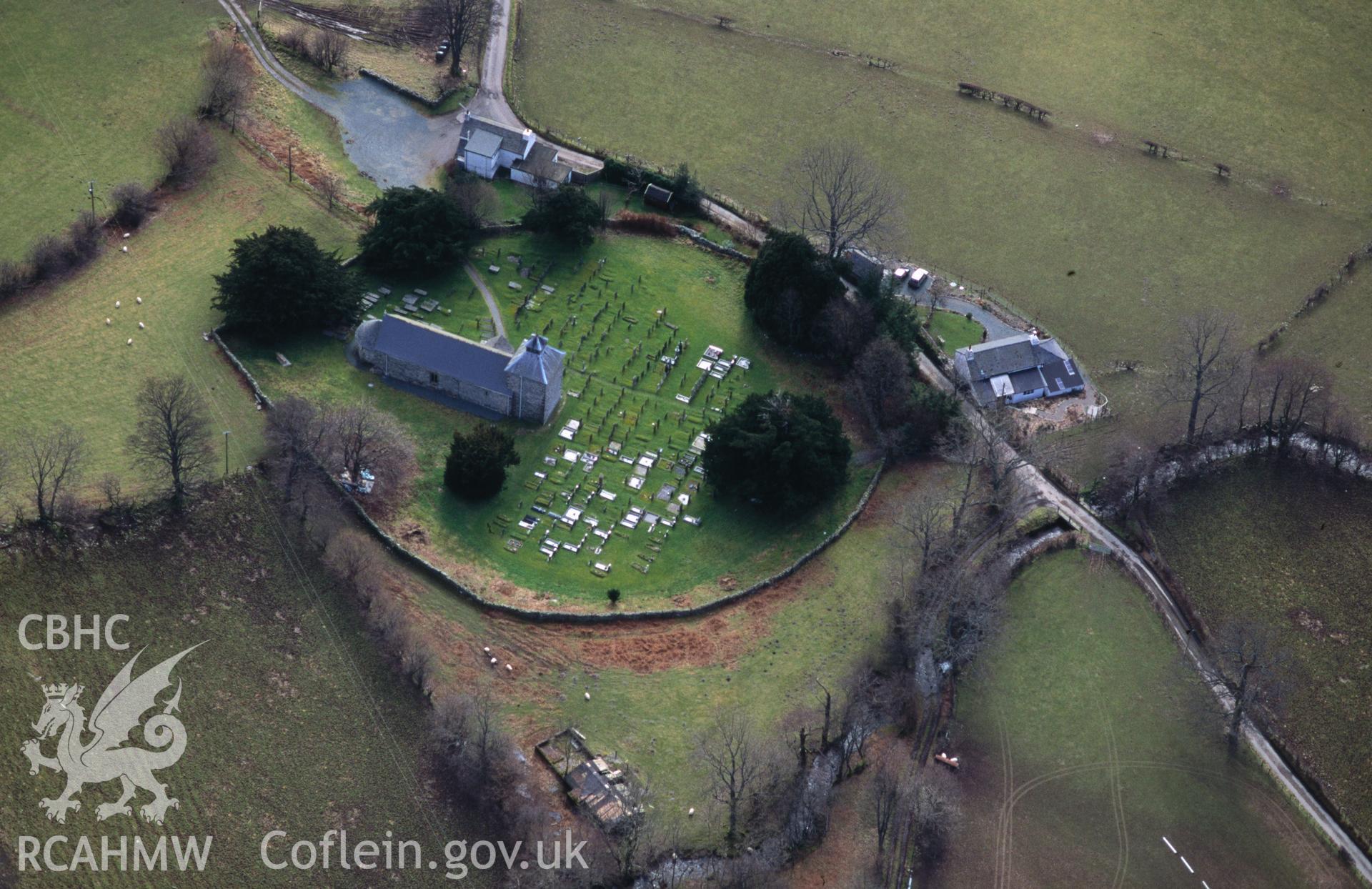 RCAHMW colour oblique aerial photograph of St Melangell' s Church, Pennant Melangell taken on 13/03/1995 by C.R. Musson