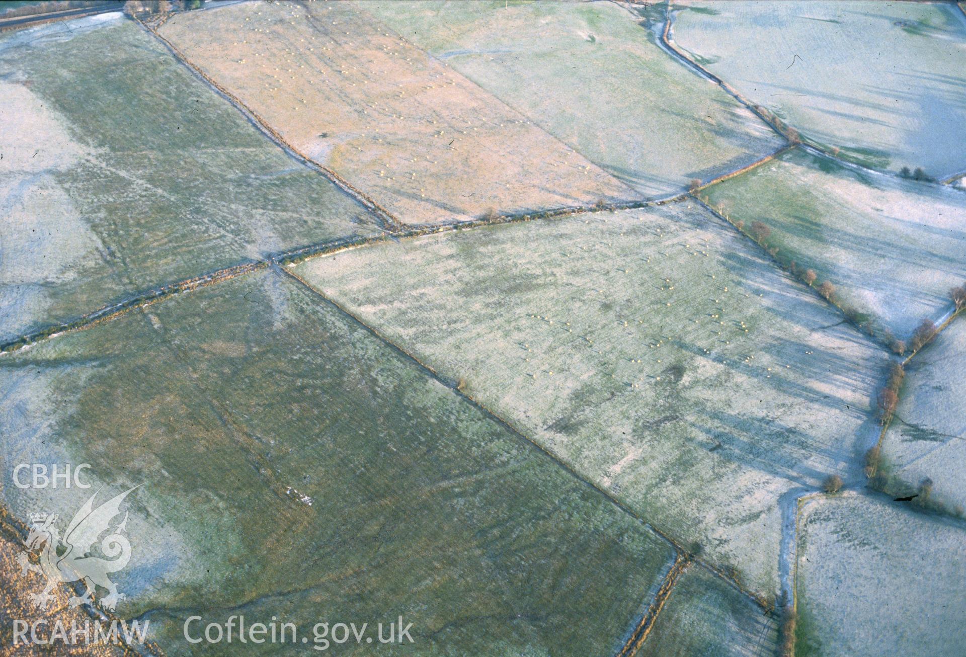 Slide of RCAHMW colour oblique aerial photograph of Caerau Roman Site, taken by C.R. Musson, 11/1/1992.