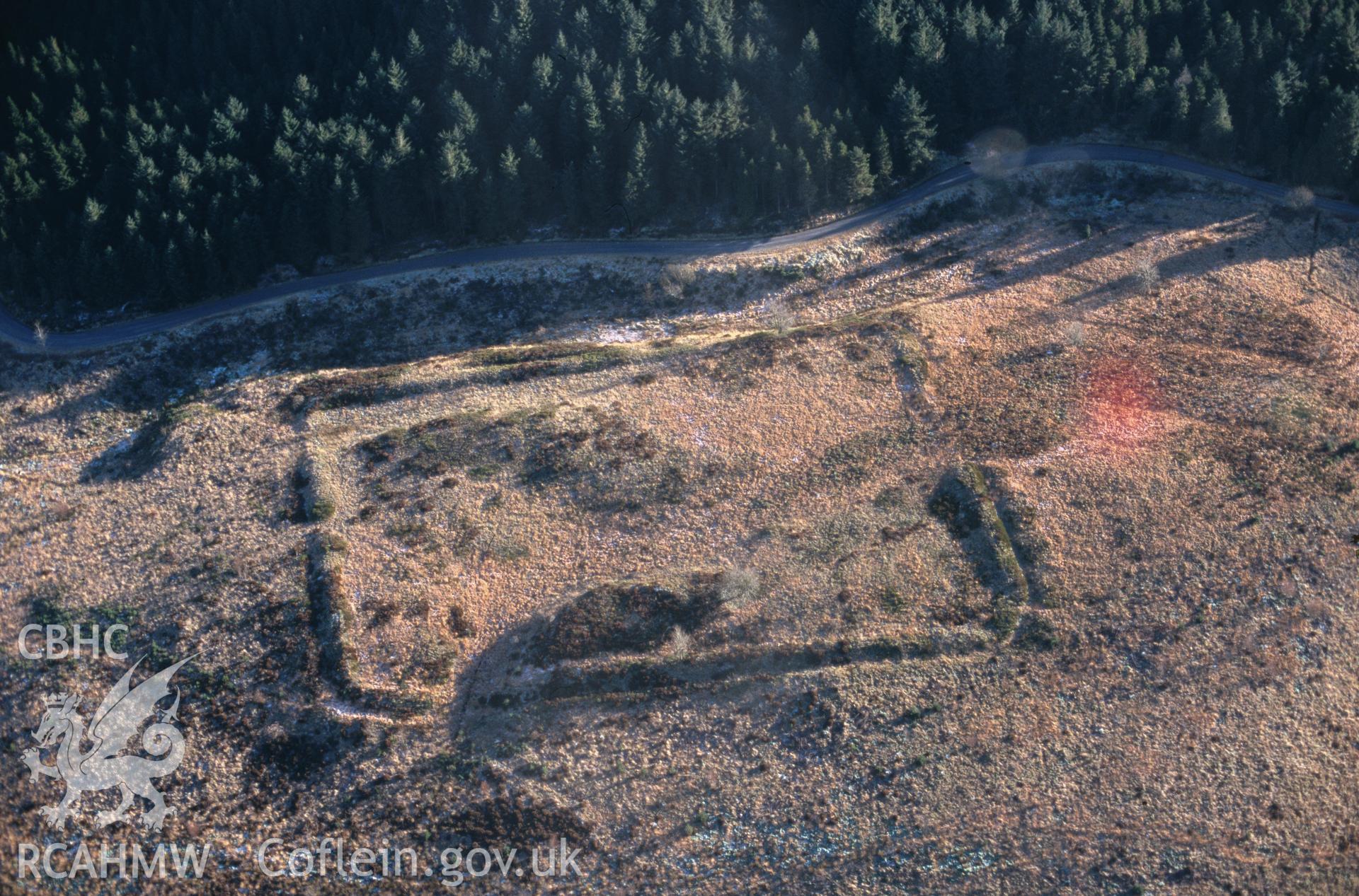 Slide of RCAHMW colour oblique aerial photograph of Cae Gaer Roman Fort, taken by C.R. Musson, 20/12/1998.