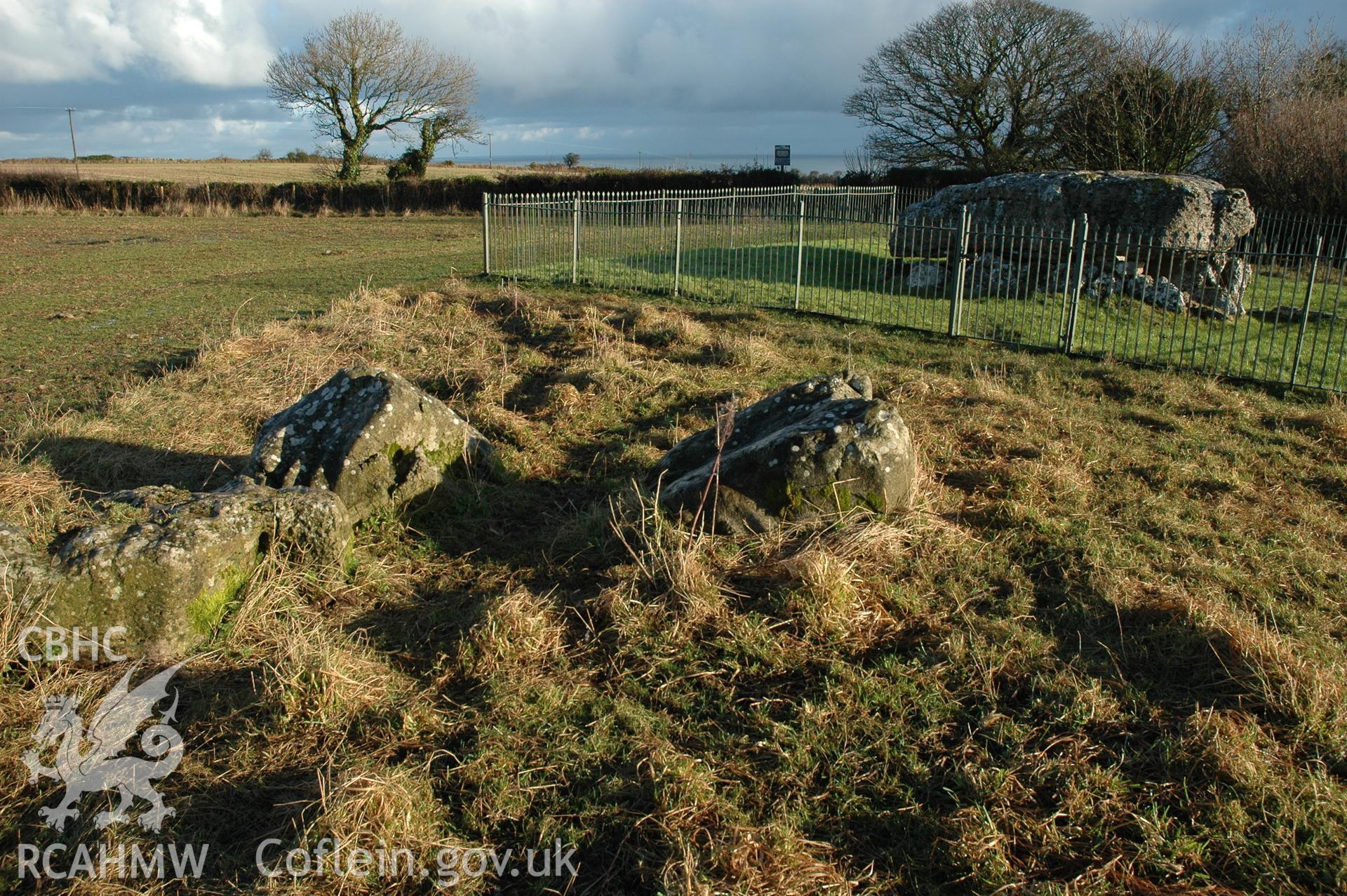 Lligwy Burial Chamber, field stones near chamber from south-west.