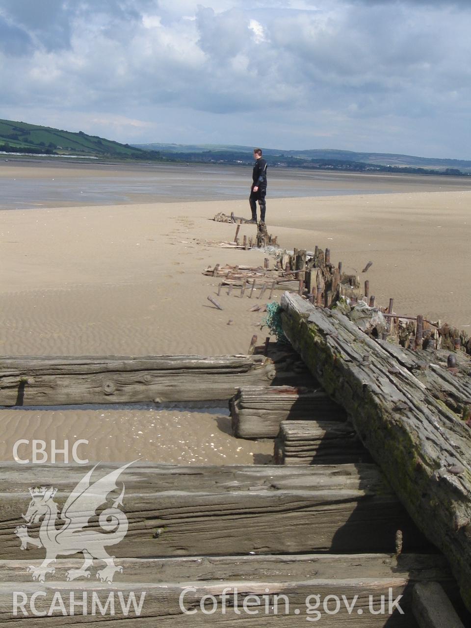 Digital photograph showing the wreck of the Paul at Cefn Sidan, produced by Ian Cundy, August 2012.